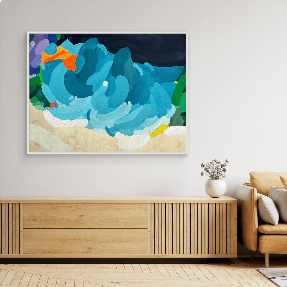 Elegant abstract painting Tidal Shift by Birgit Trofer in a white floating frame, styled above a light oak console table in a bright Mediterranean living room.