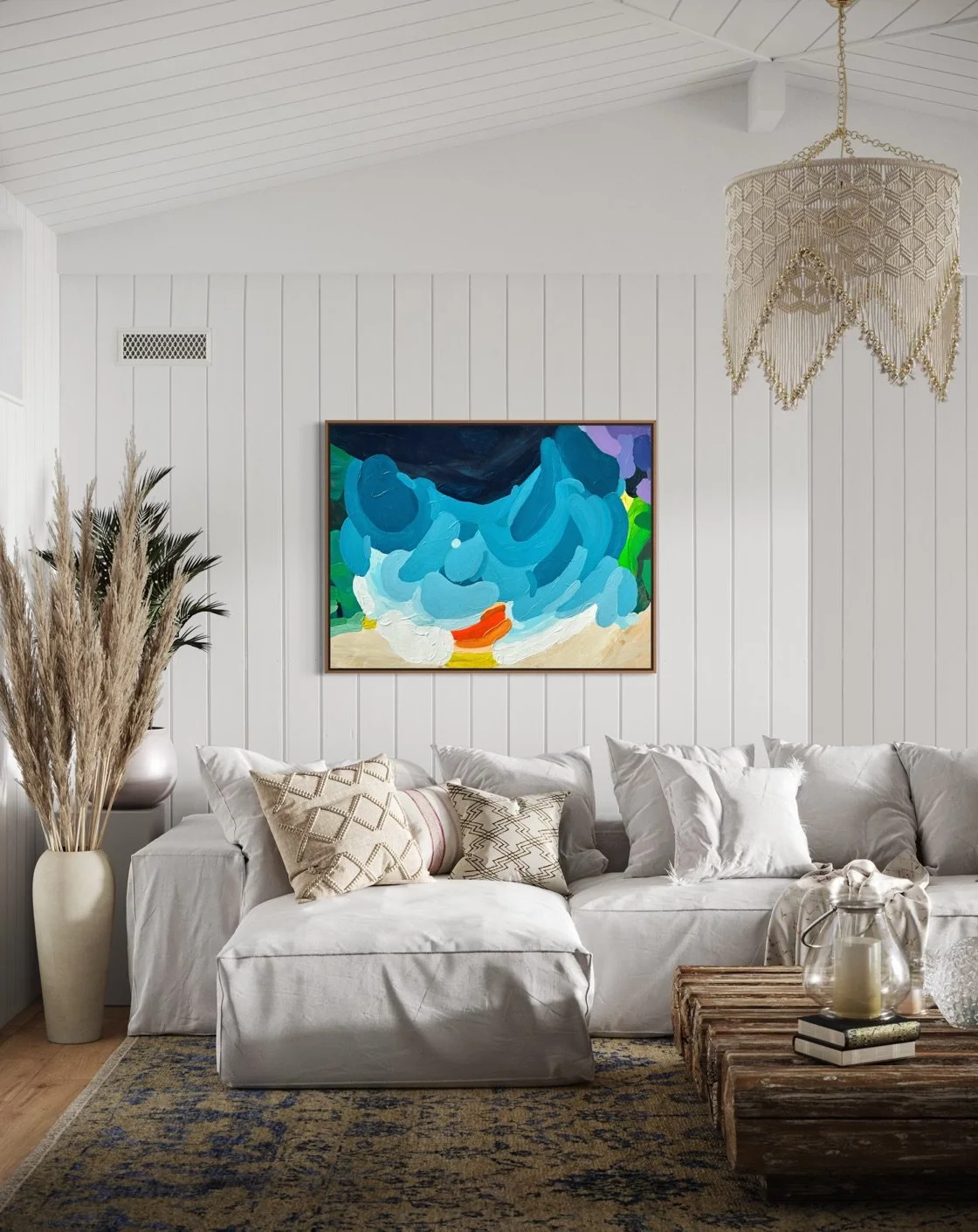 Großformatiges Acrylbild von Birgit Trofer mit maritimer Farbdynamik in einem gemütlichen mediterranen Wohnzimmer mit heller Couch und natürlichen Materialien.