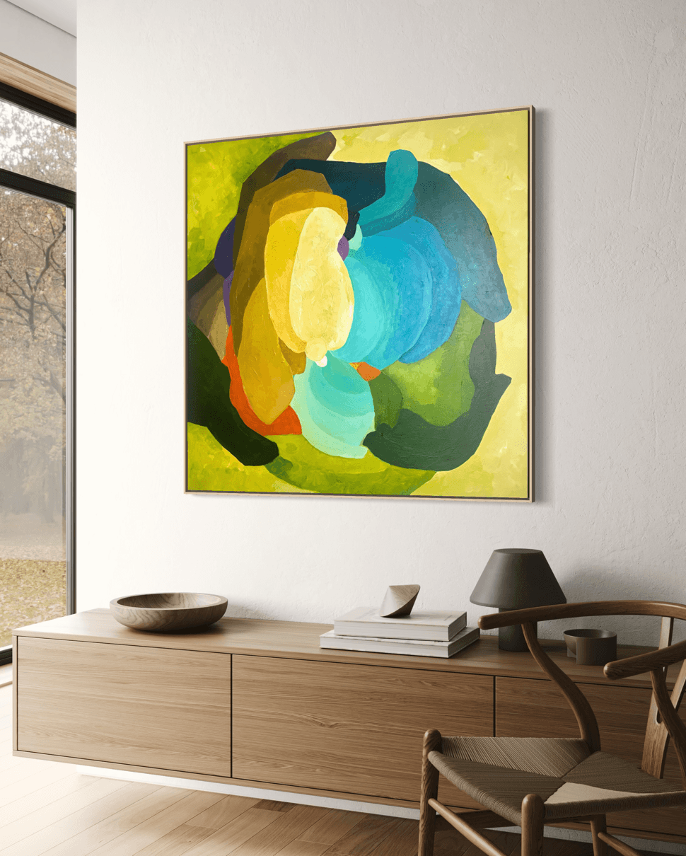 Centered Blooming - original abstract artwork by Birgit Trofer, mounted on a light wall in a modern living room above a shelf.