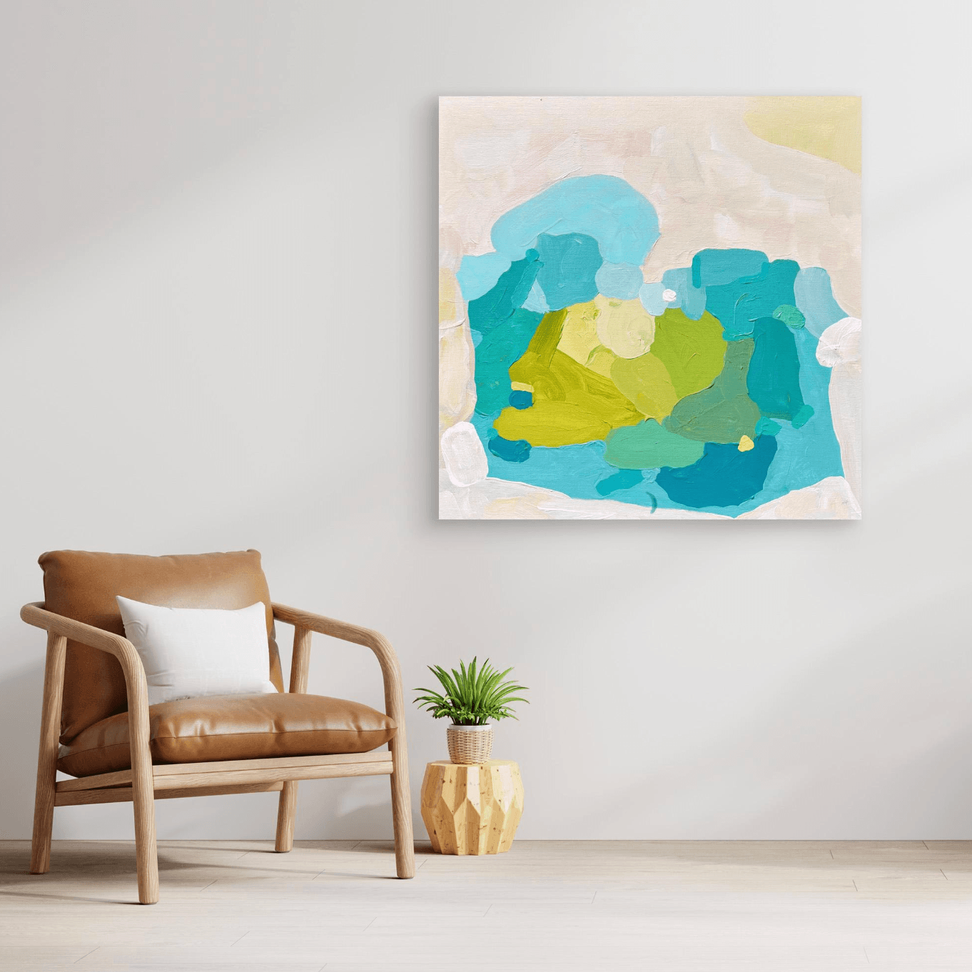 Fine art print on canvas by Birgit Trofer, styled in a cozy living room with comfortable leather chair.