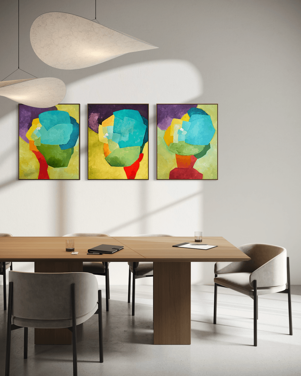 Three paintings by artist Birgit Trofer - Bold Allure, Graceful Resilience and Constructing Balance, in an elegant contemporary meeting room.