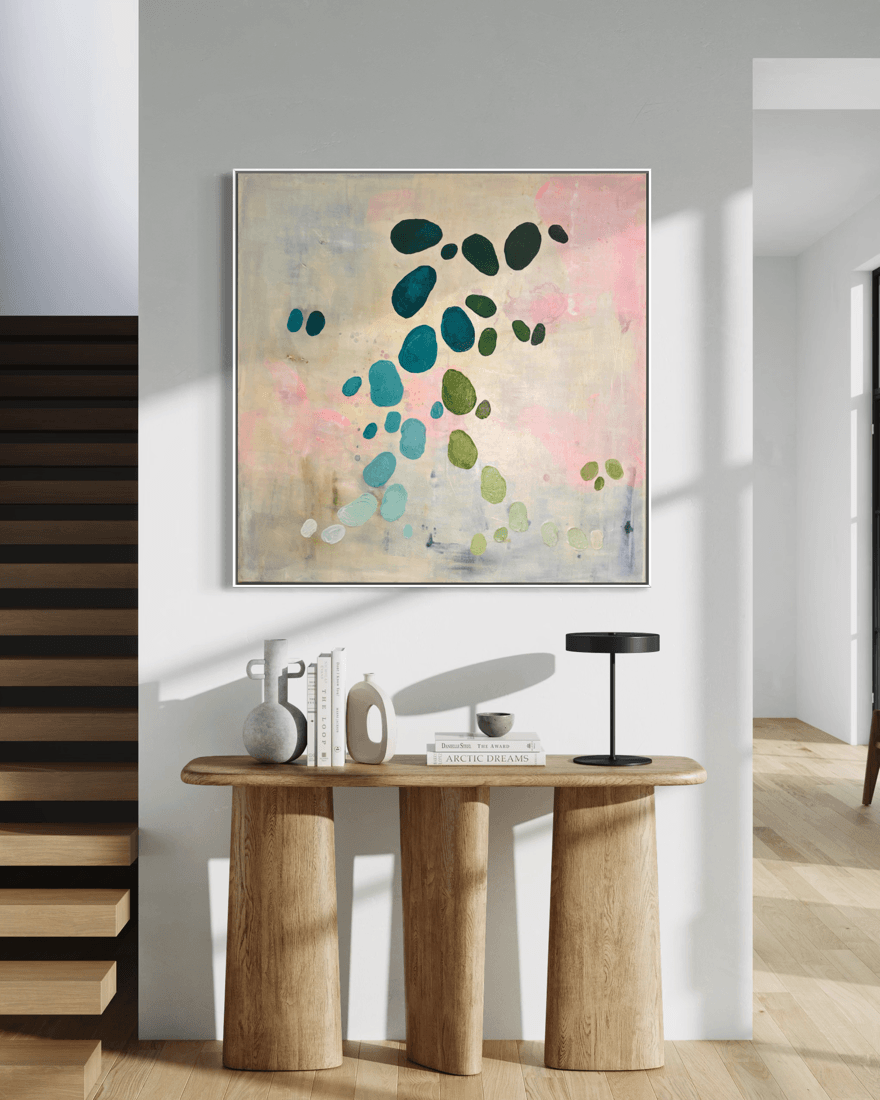 Artwork from the series Dancing Palette by Birgit Trofer mounted in a contemporary hallway above a sideboard.
