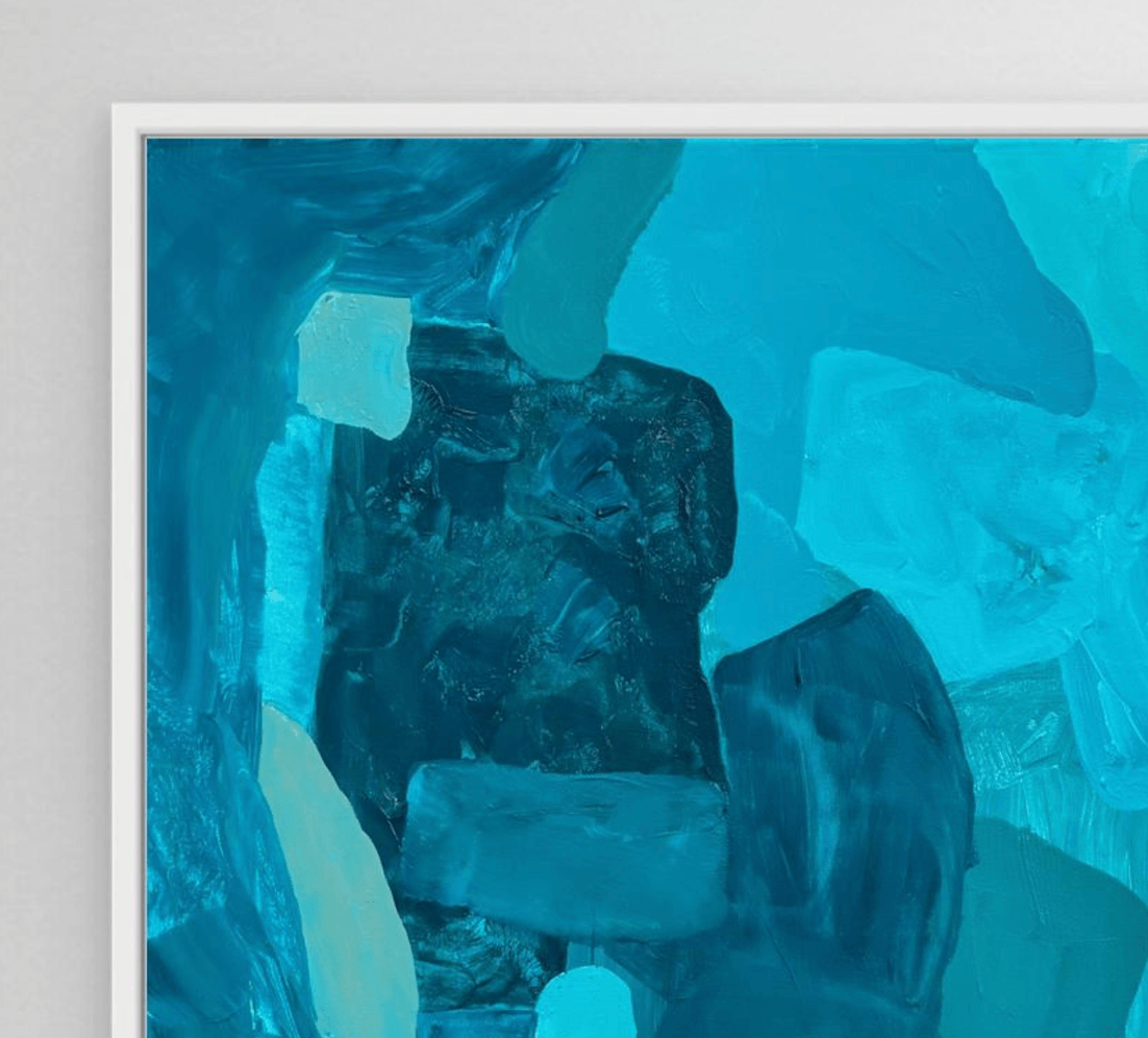 Close-up detail of the abstract print Sunset Flow by Birgit Trofer, highlighting the professional print quality, rich color contrast, and the crisp white floating frame.