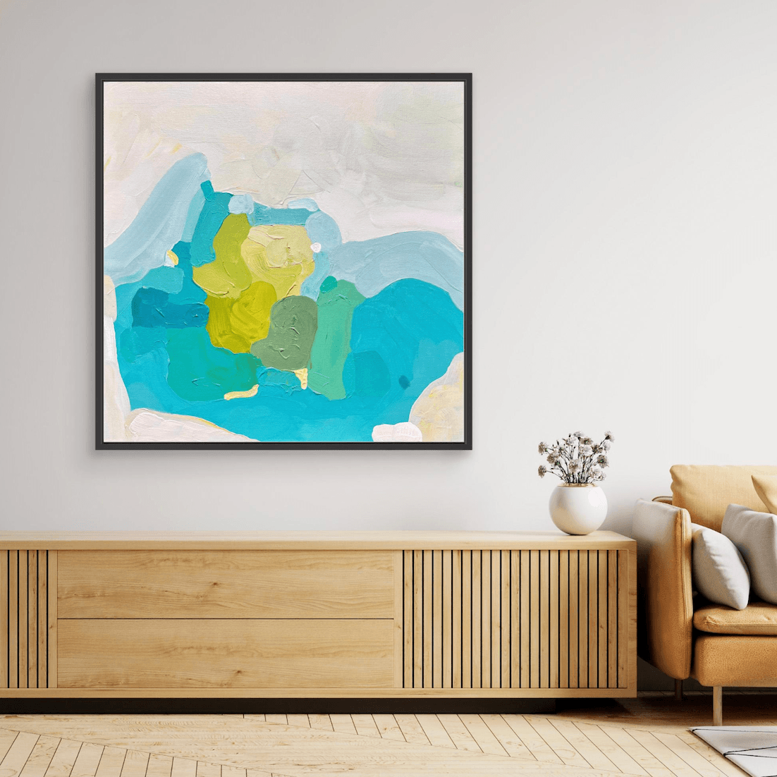 Beach inspired artwork by Birgit Trofer, titled ocean retreat, in black floating frame, styled in mediterranean living room.