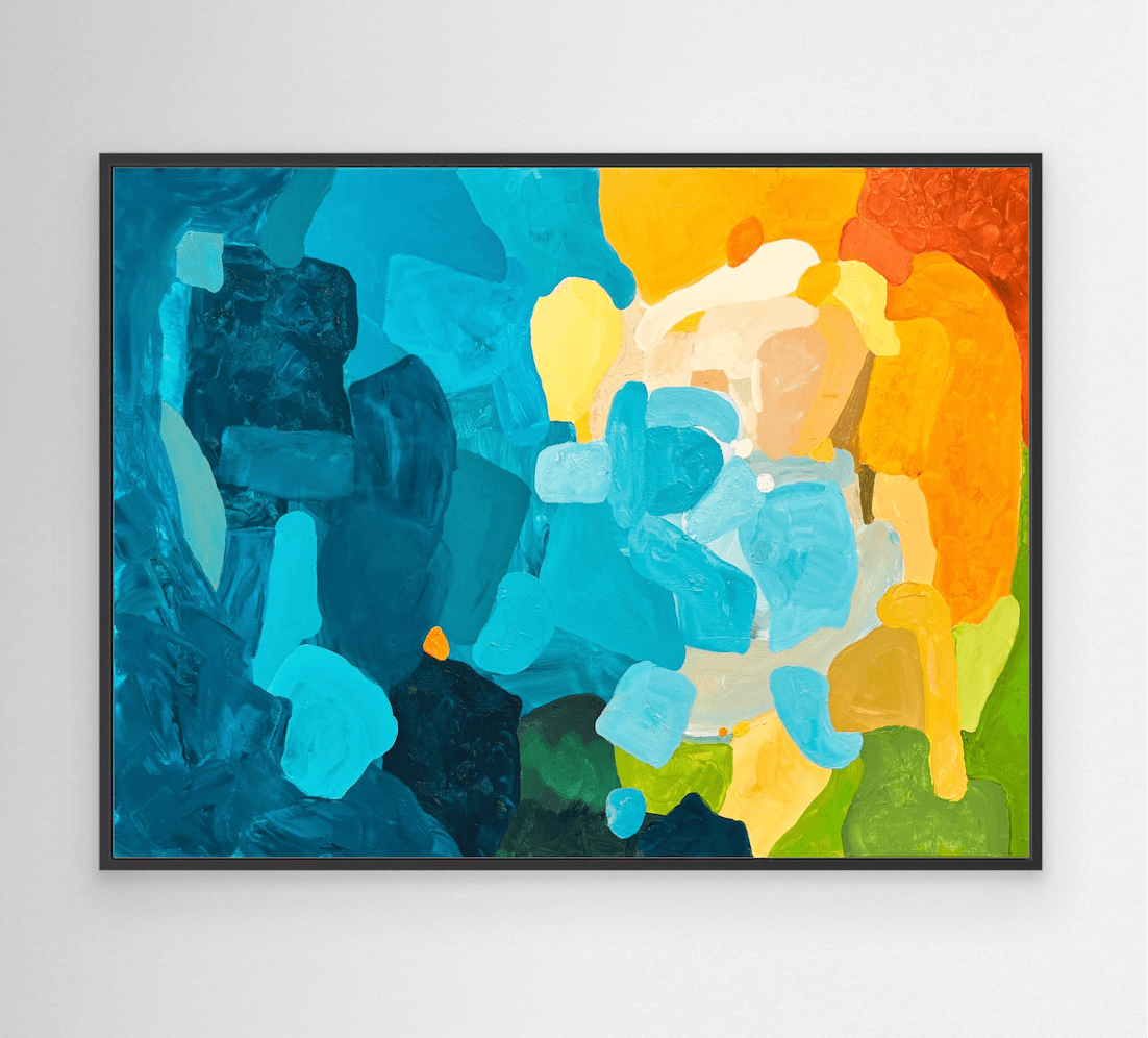 Premium fine art canvas print Sunset Flow by Austrian artist Birgit Trofer, featuring intense blue and orange shades in a sophisticated black floating frame.