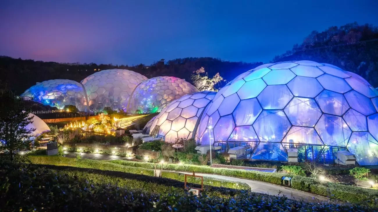 A photo of Eden's biodomes lit up for the Winter season.