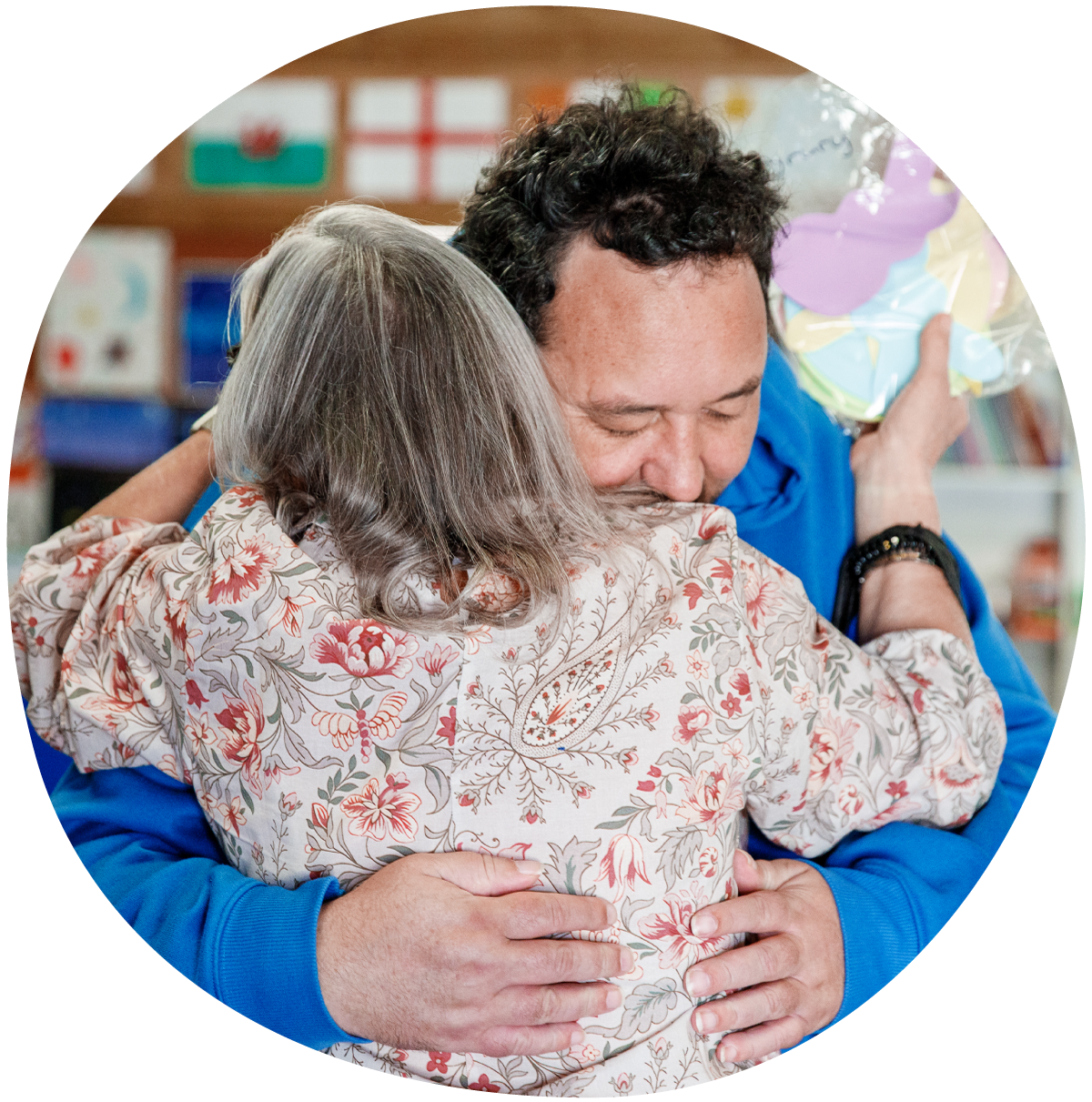 Solway Vision support worker hugging resident