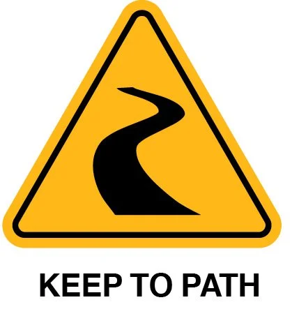 Yellow road sign with a black winding road symbol and the words "Keep to Path" below.