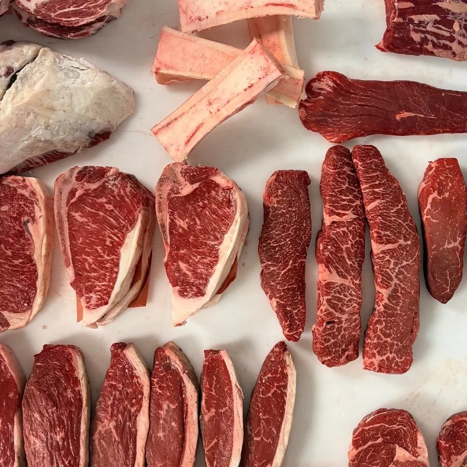 Fresh steaks and marrow bone from local whole animal butcher shop.