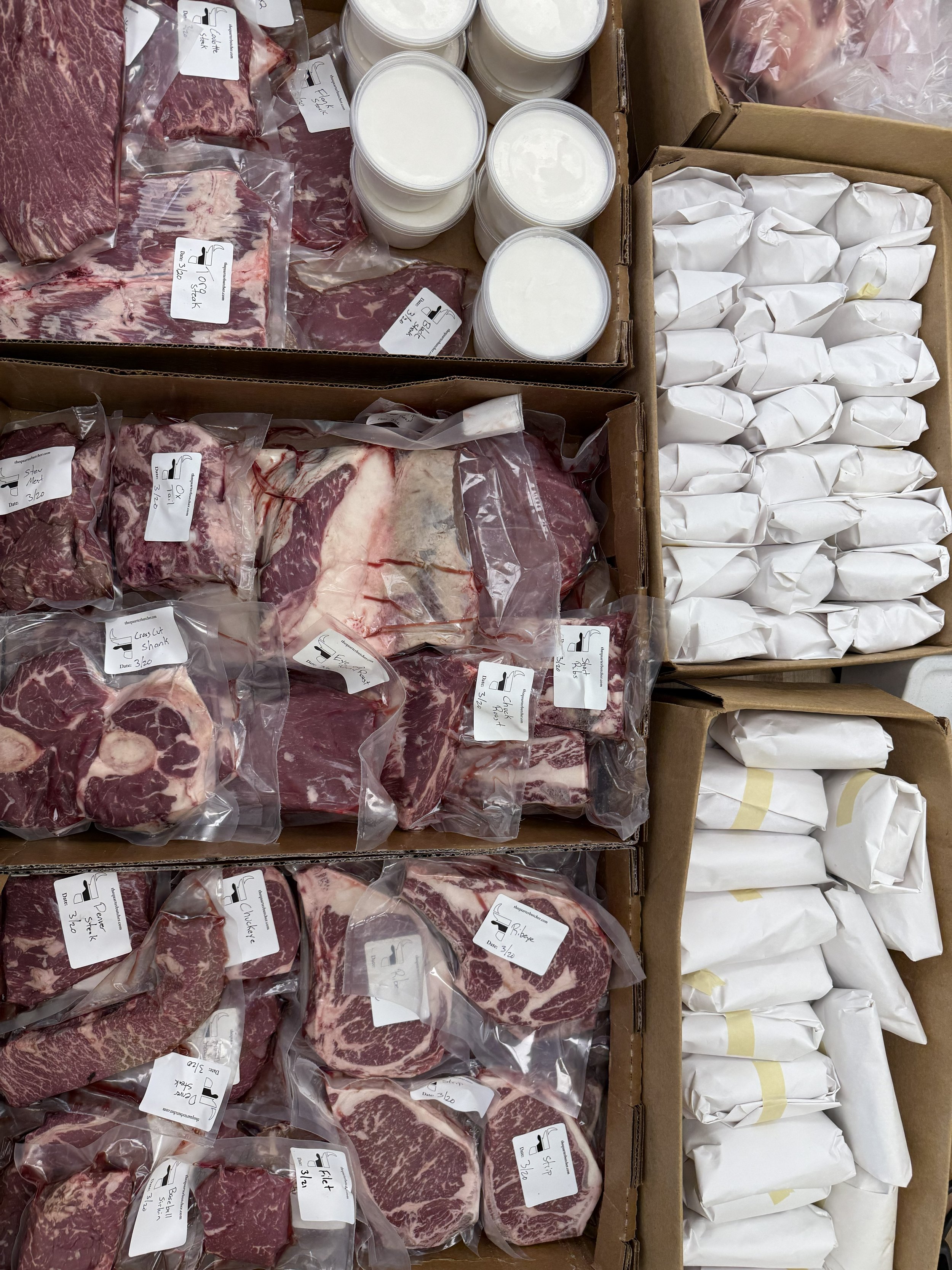 Quarter Cow bulk beef boxes with vacuum and freezer paper wrapped local meat.
