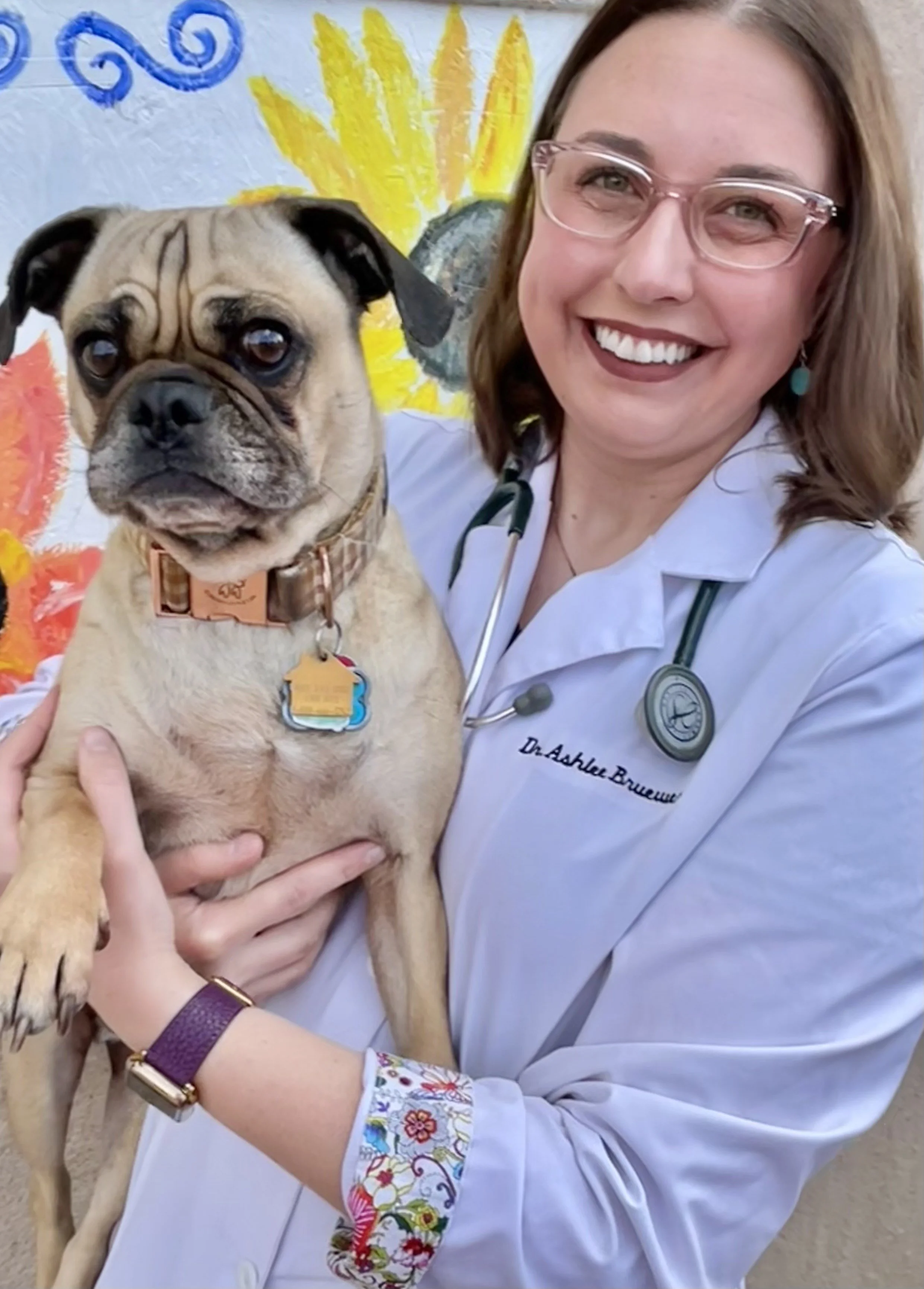 Dr. Ashlee Bruewer with dog