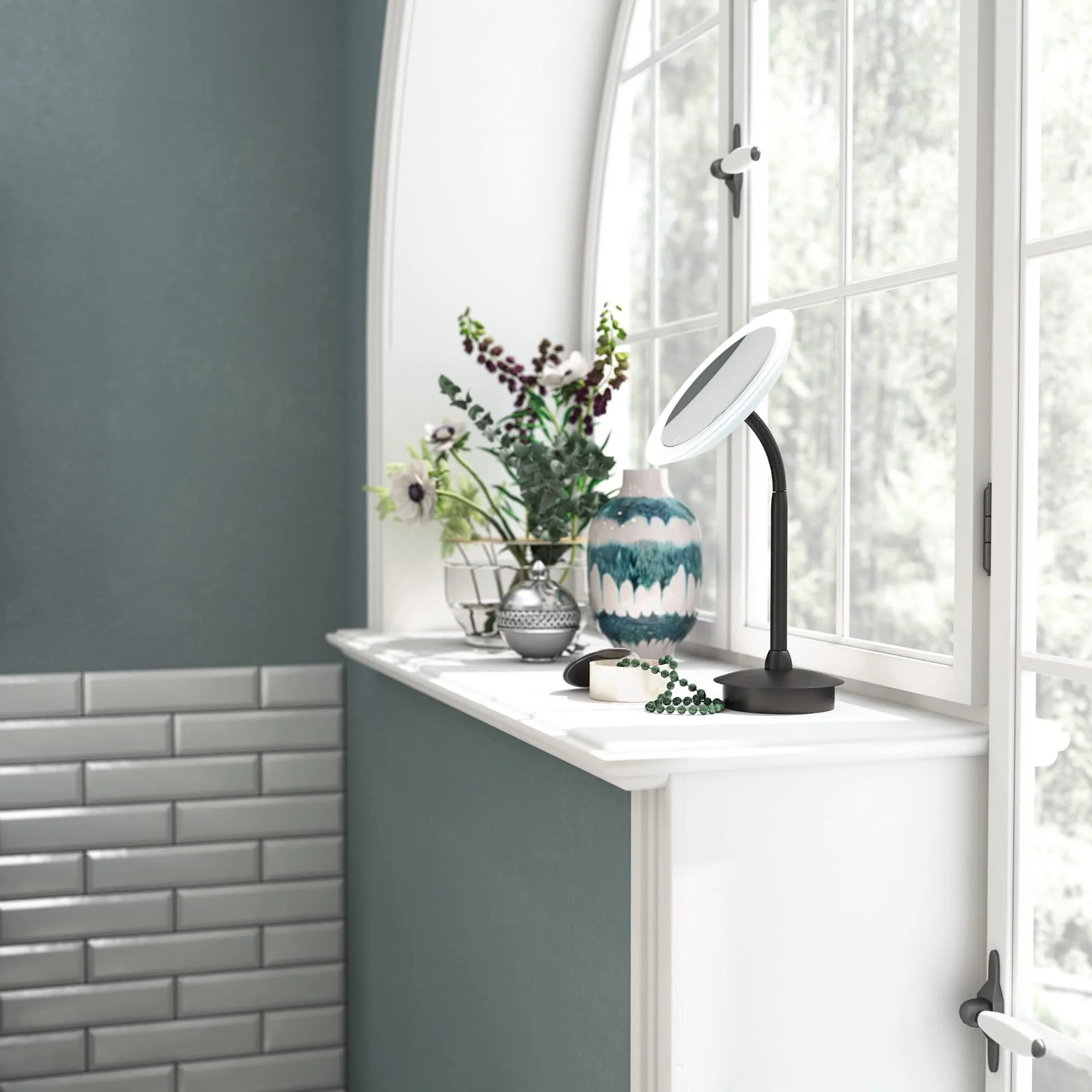 Decorative flower arrangement, a mirror, and a necklace on a white windowsill in a room with blue and white walls.