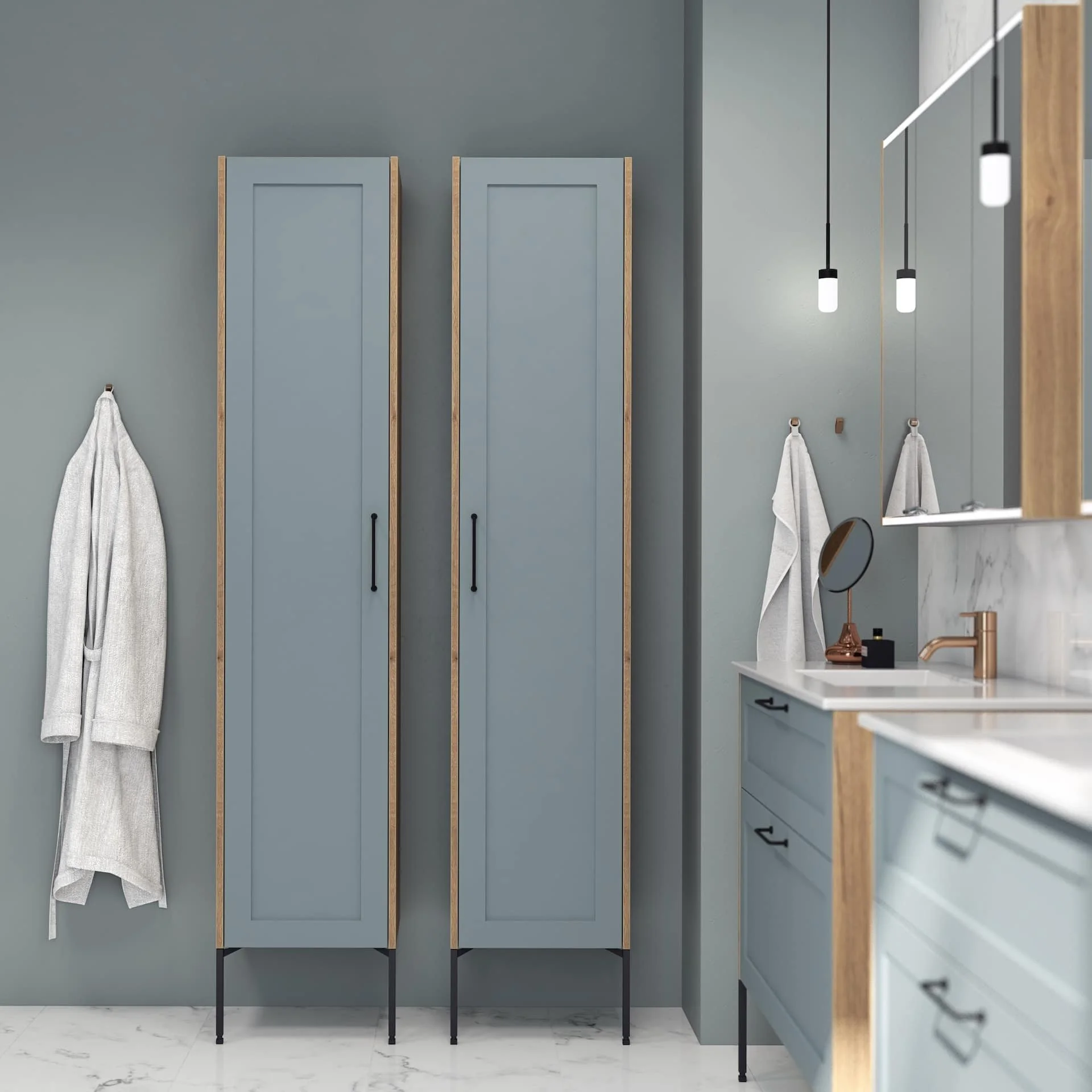 Modern bathroom with two tall, blue lockers, white towels hanging, and a countertop with a small mirror, soap dispenser, and hanging pendant lights.