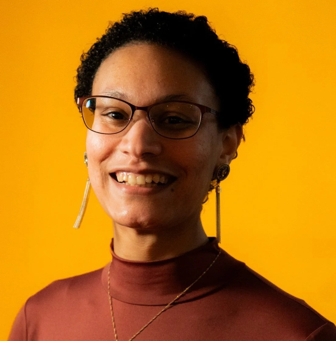 Portrait of Salena J. Deane, one of the contributors of Write With Community, Inc.