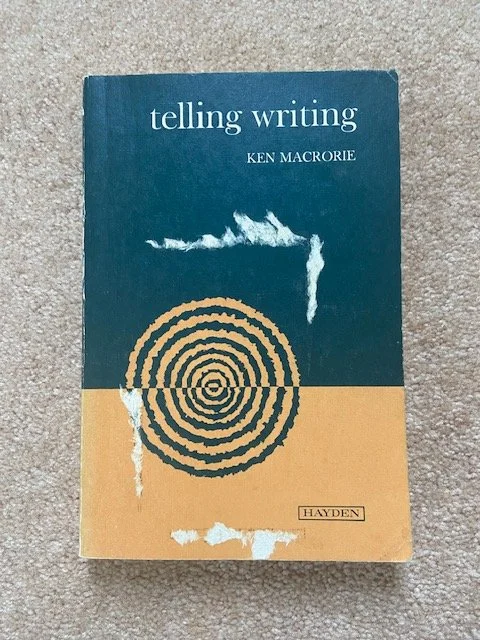 A book titled “Telling Writing” by Ken Macrorie with a minimalist design featuring a spiral graphic