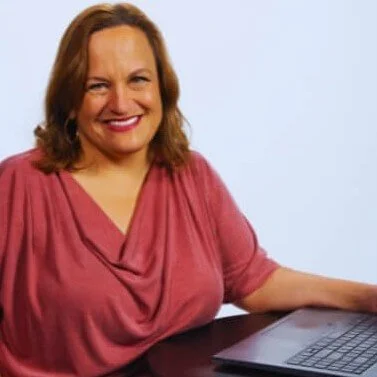 Michelle Croyle, LPC at computer fordoing an EMDR Therapy Intensive in Pittsburgh and Philadelphia and Pennsylvania Christian faith-based counseling therapy available