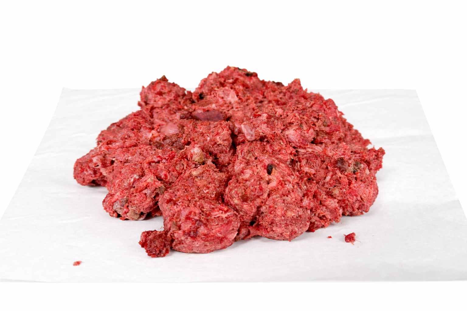 Raw Dog Food mixture on white paper