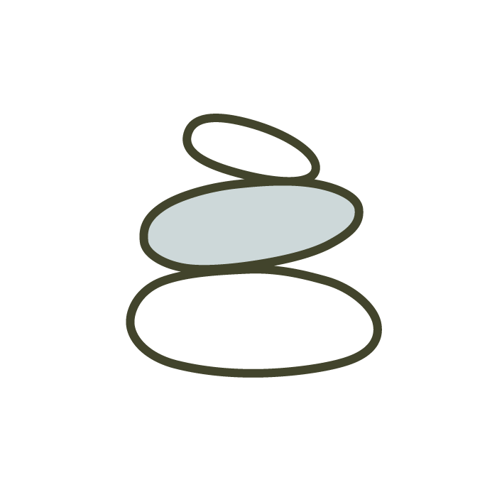 Stacked smooth stones with the word 'Zen' above them