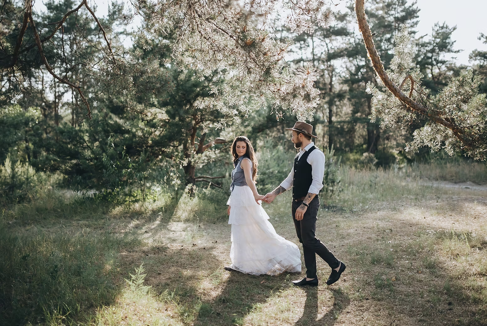 Dairy House farm barn wedding - somerset - wedding couple in woods