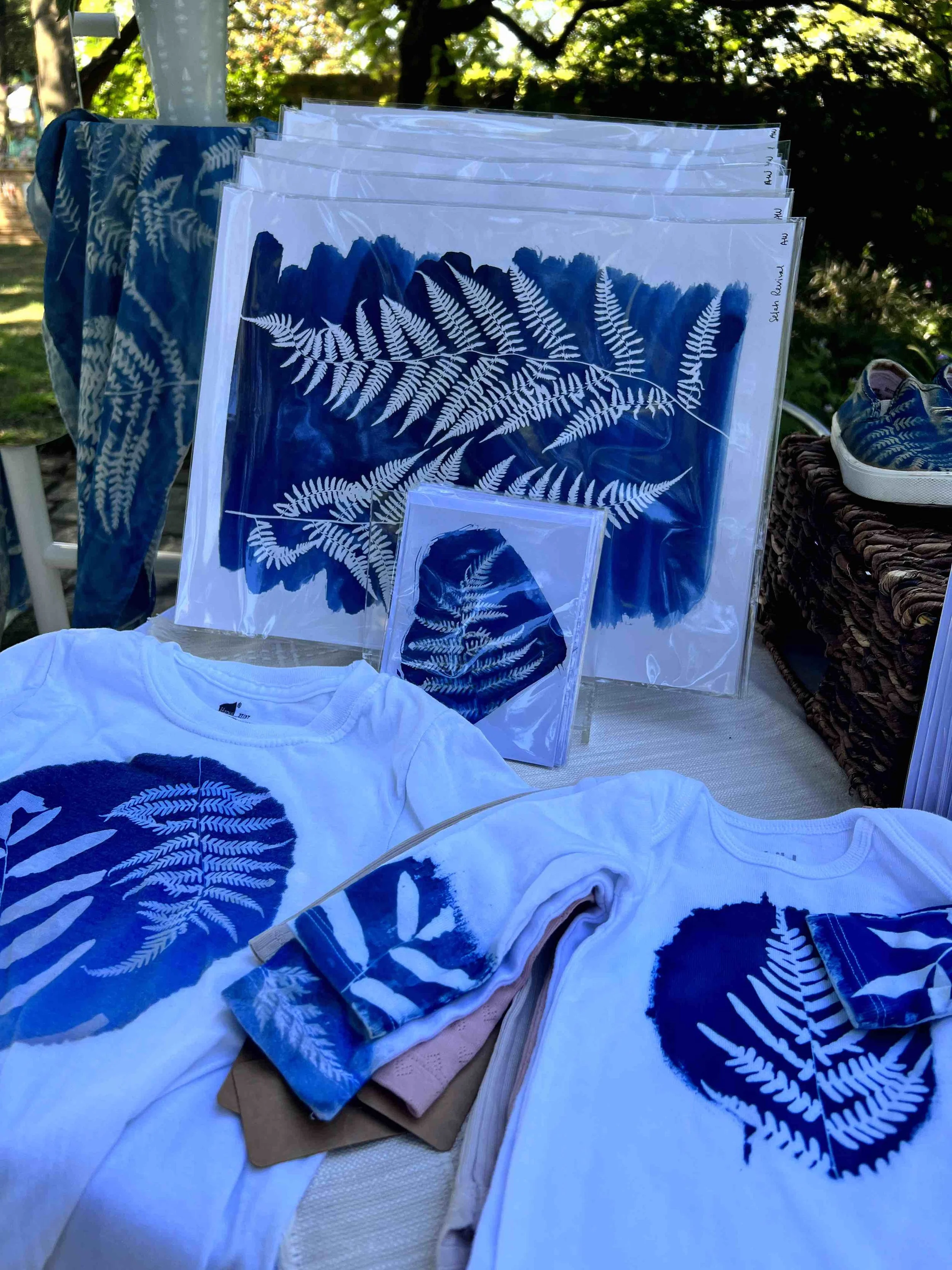 Cyanotype printed goods on table at market