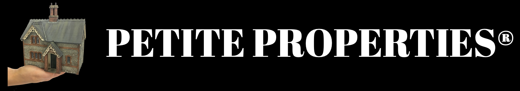 A hand holding a miniature model of a house with the words "PETITE PROPERTIES" in large white text on a black background.