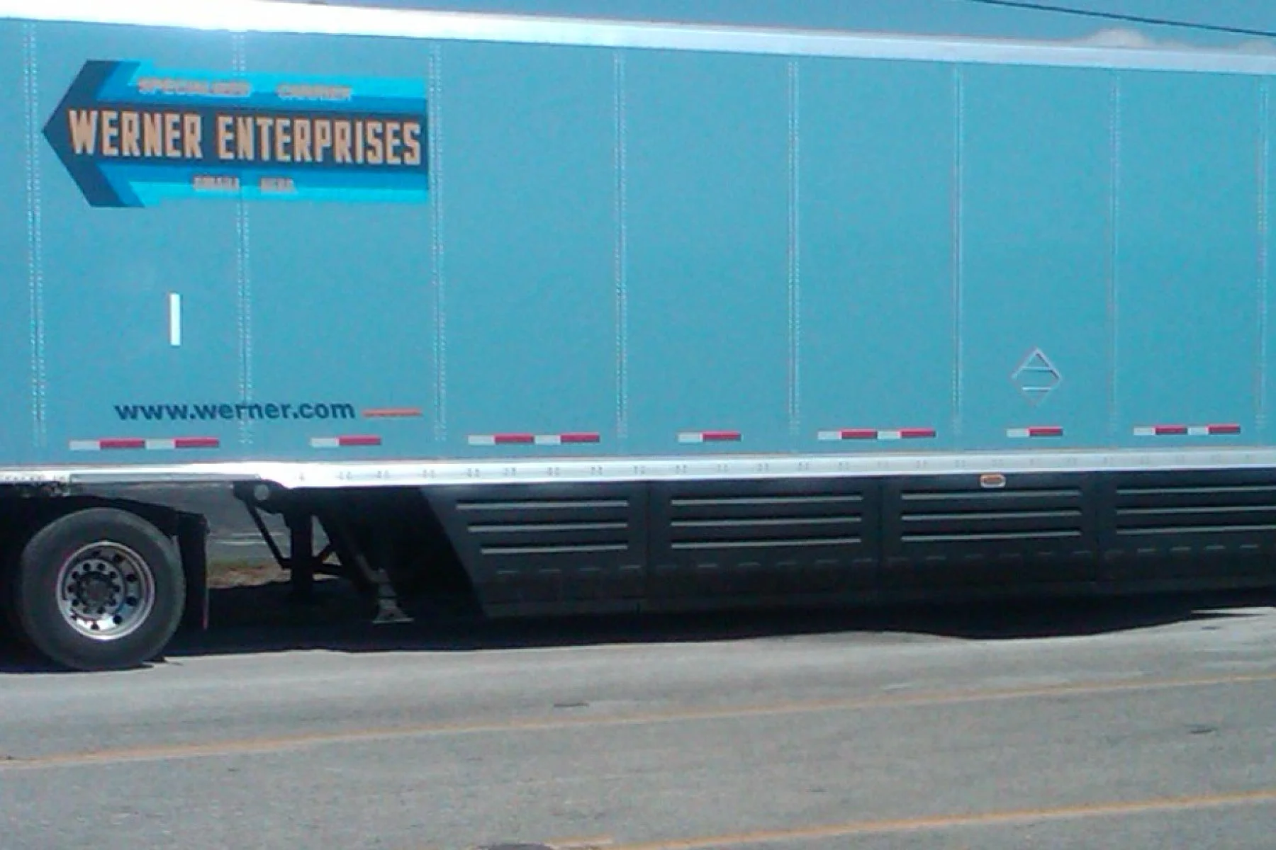 Semi-Trailer with Skirt Panel