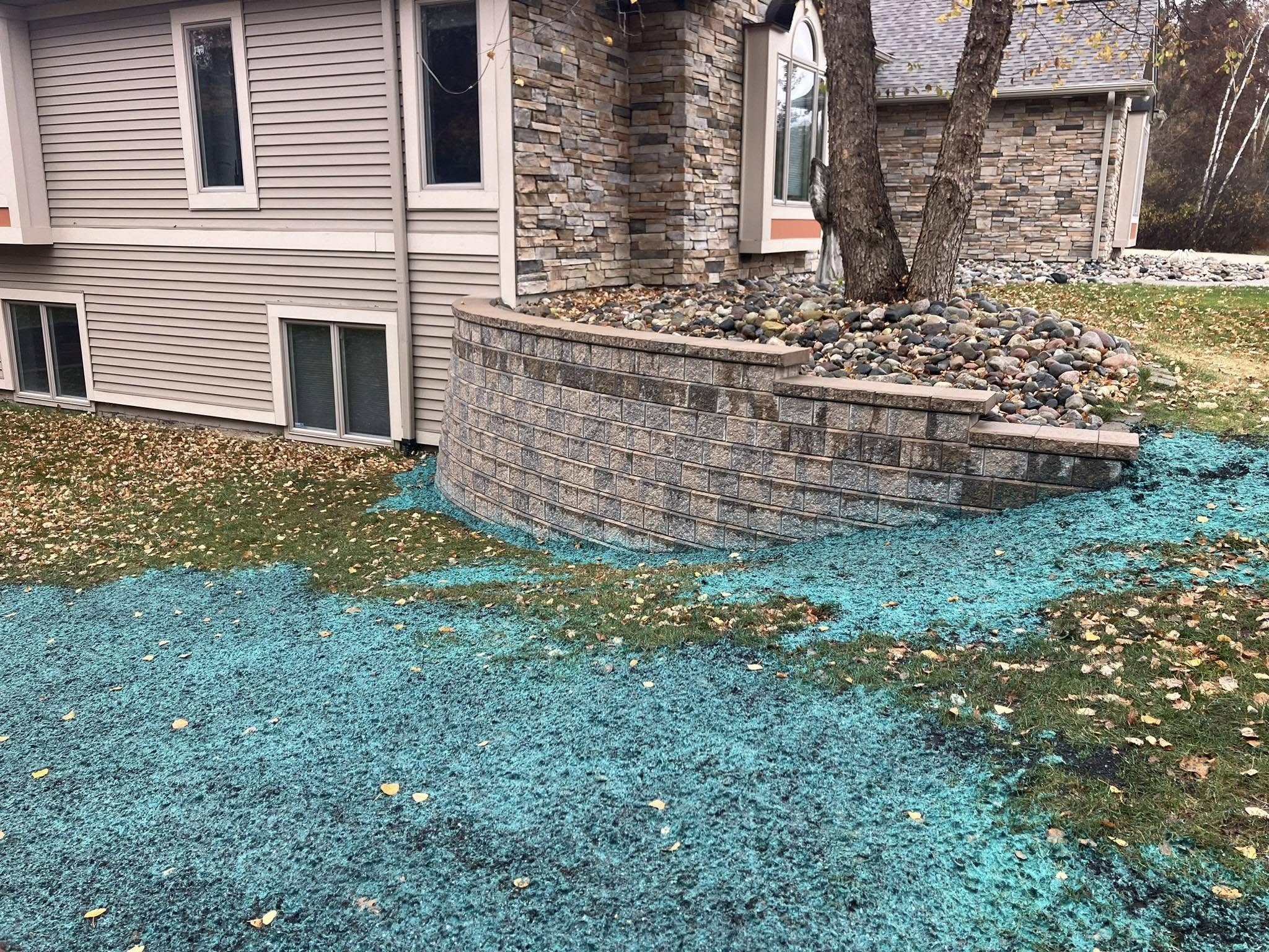 Retaining wall and hydroseeding