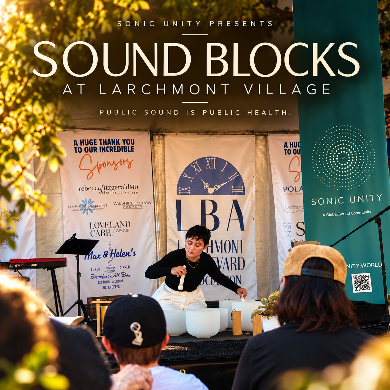 Sandy Duarte on stage leading a sound bath with Sonic Unity’s Sound Blocks initiative at Larchmont Village in Los Angeles, bringing accessible sound healing into public spaces.