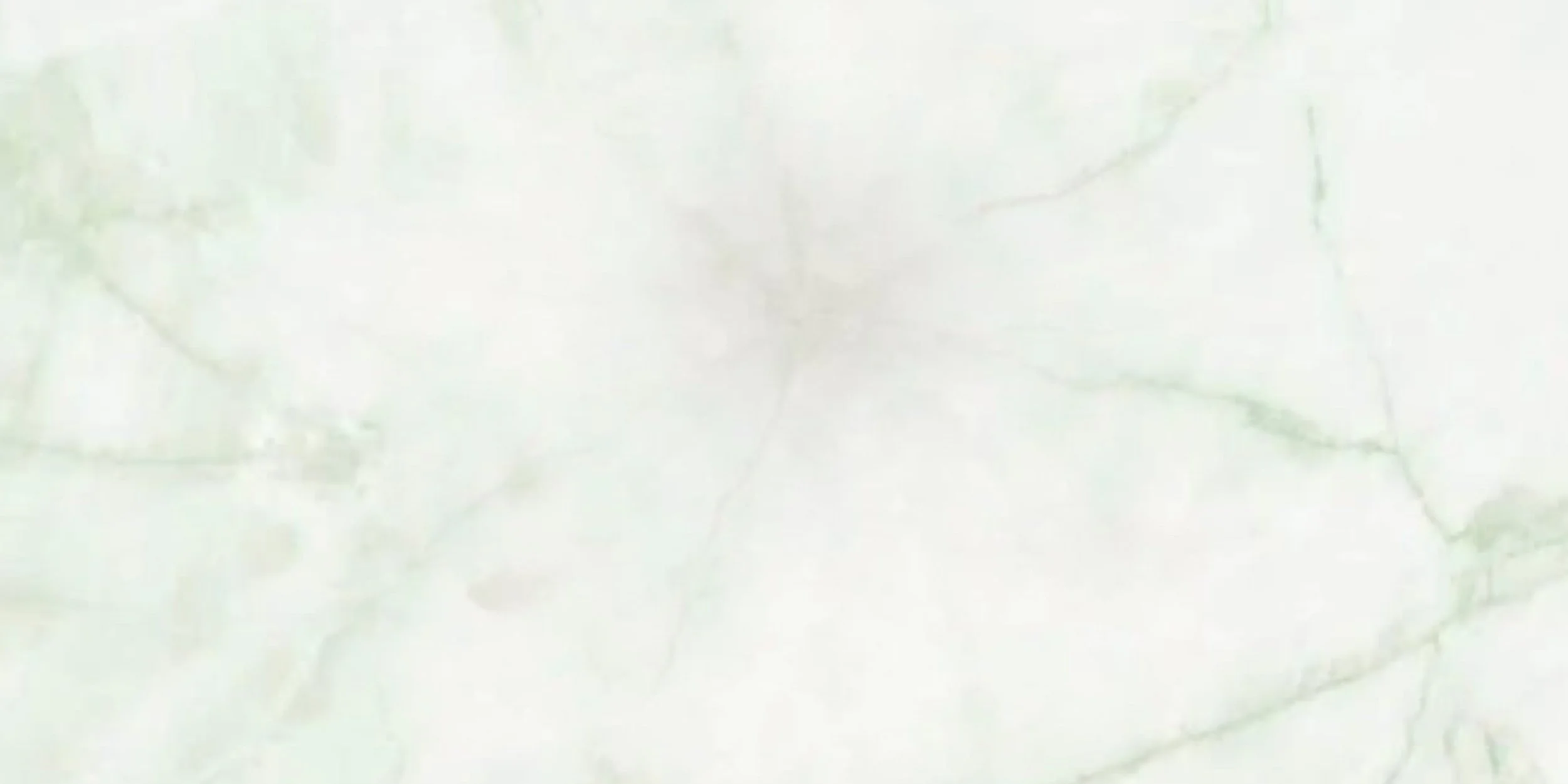The image shows a light-colored marble or stone surface with subtle green and gray veining.