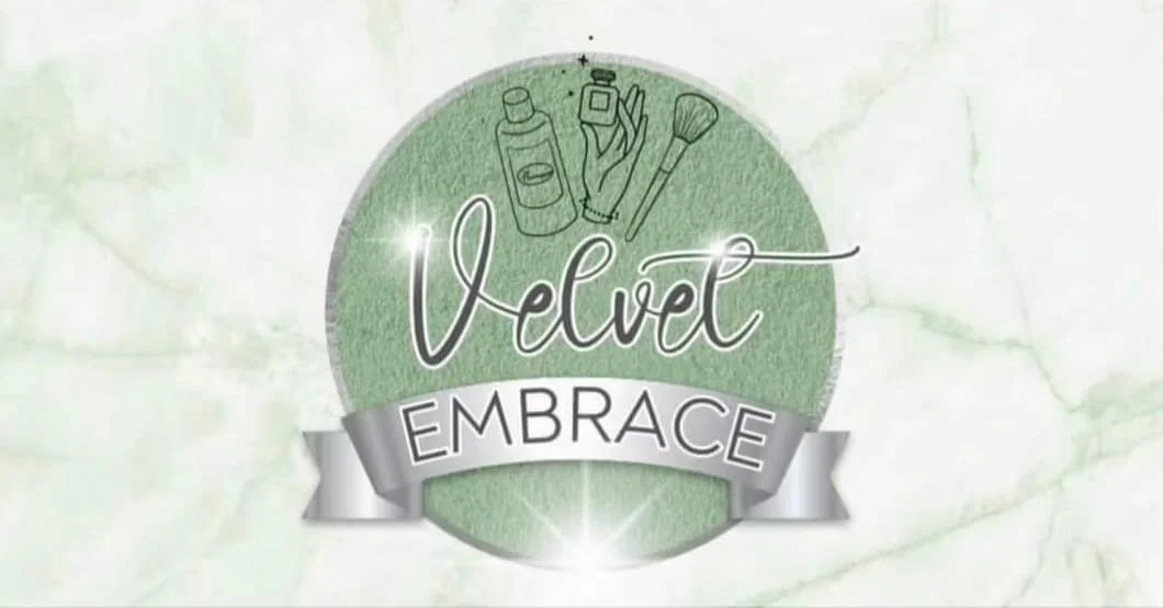 A logo with a green circle background showing beauty and skincare products at the top, with the word "Velvet" in cursive and "Embrace" on a silver ribbon below.