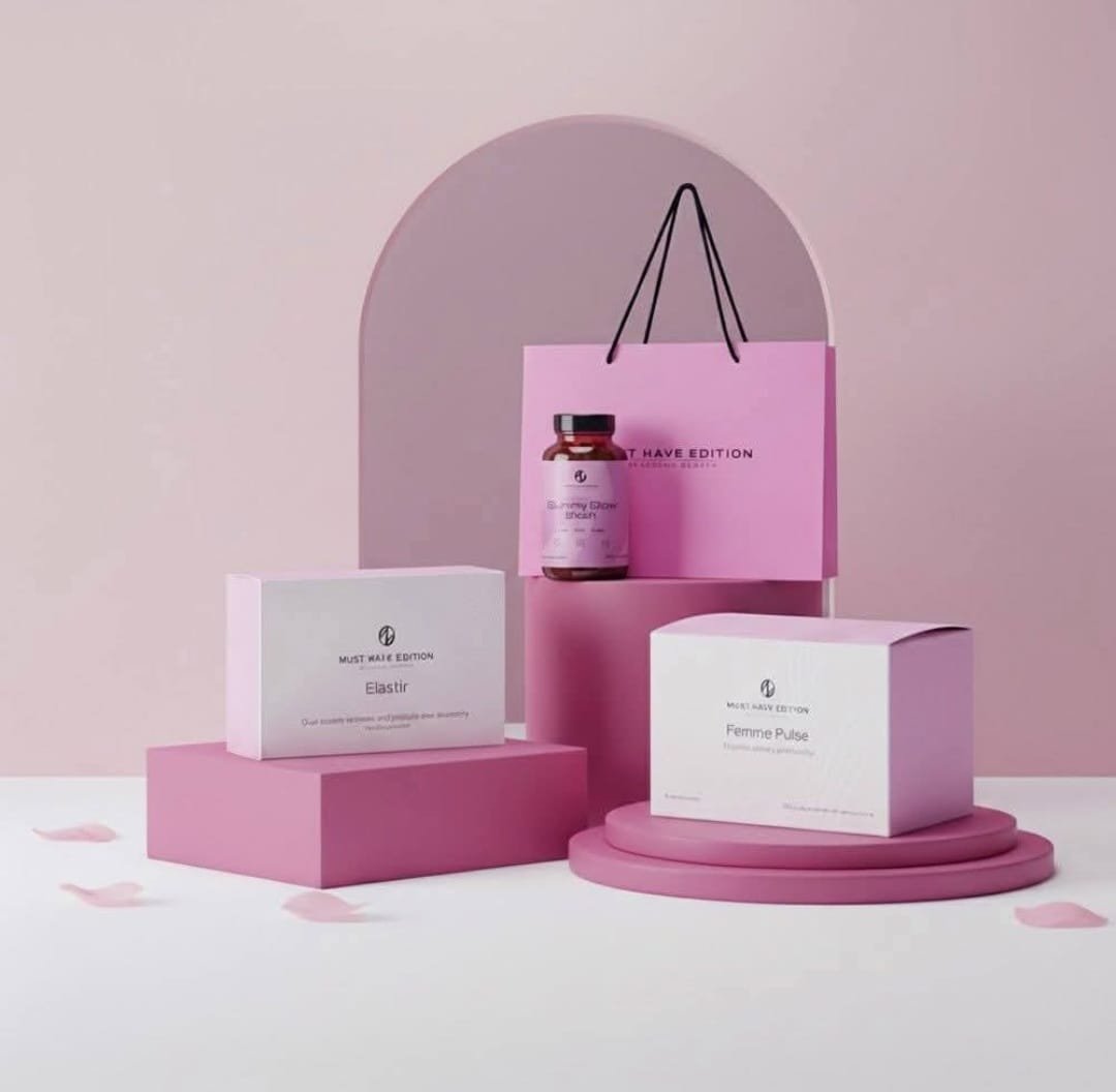 A display of health supplements, including a bottle and boxes, arranged on pink and white platforms with a pink shopping bag hanging on a pink arch in the background, decorated with pink rose petals.