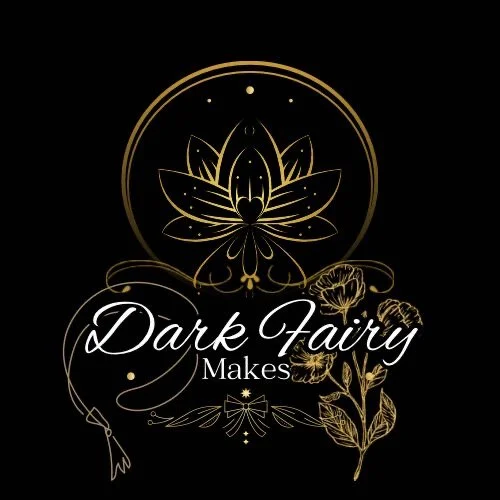 Gold illustration of a fairy butterfly with floral elements and the text 'Dark Fairy Makes' on a black background.