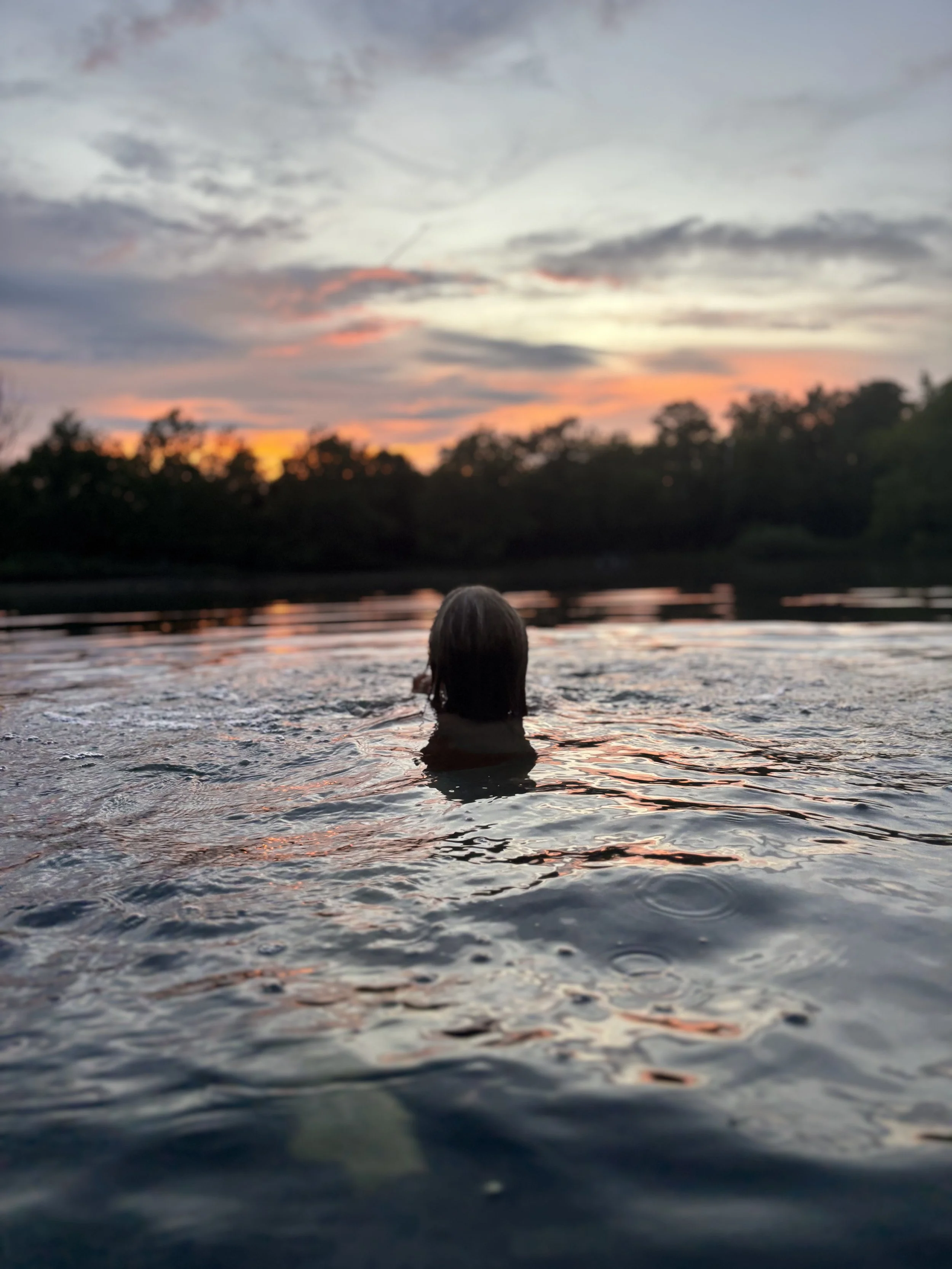 Evening swim at Silver Cup Lake during a colorful Ohio sunset
