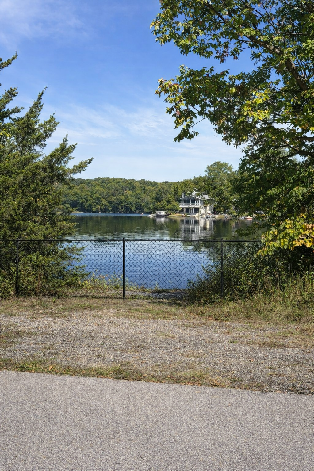 a lakeside view into silver cup lake in cedarville, ohio looking from the bike trail on the ohio to erie trail