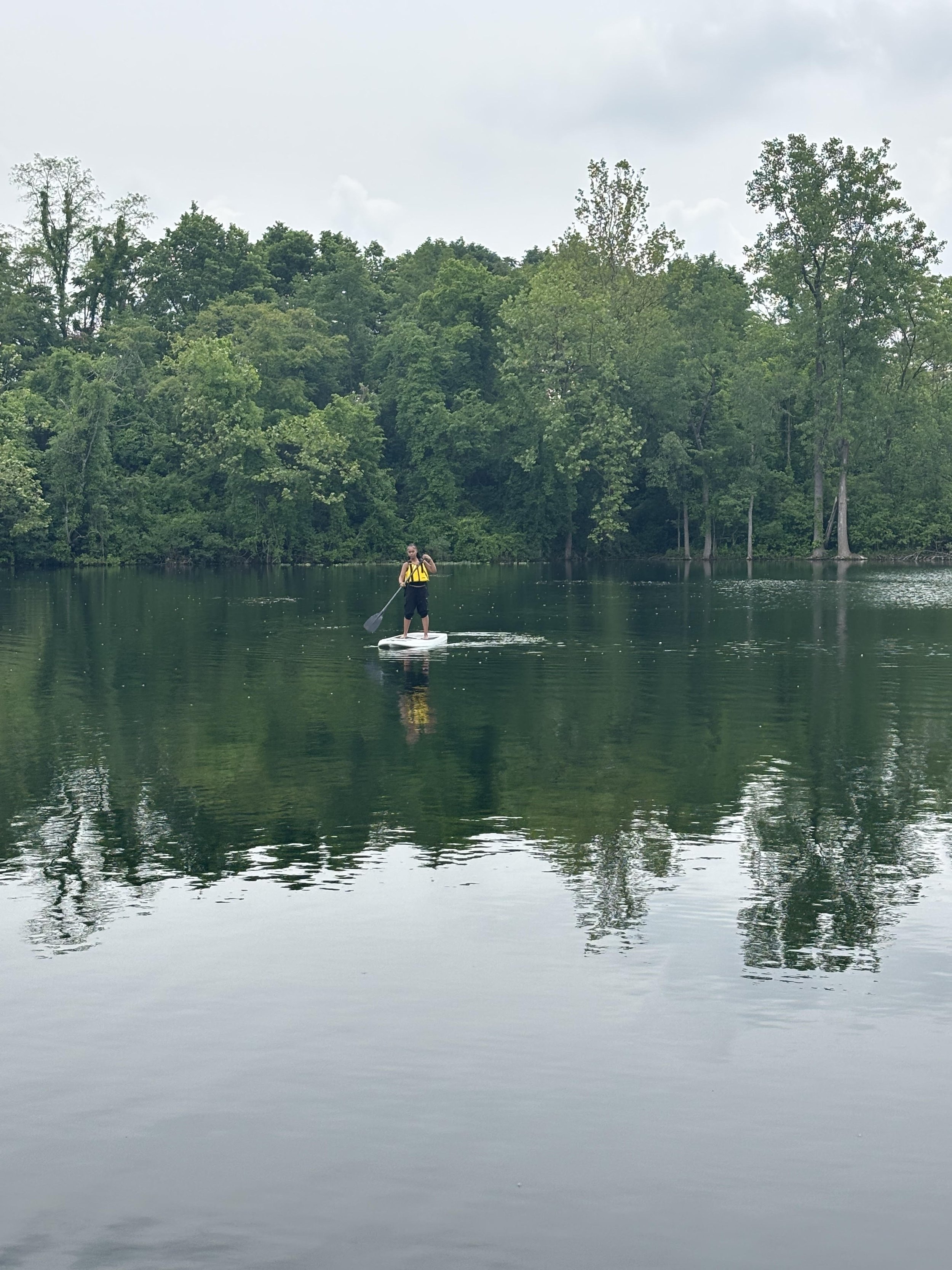 Guest paddleboarding at Silver Cup Lake in Ohio