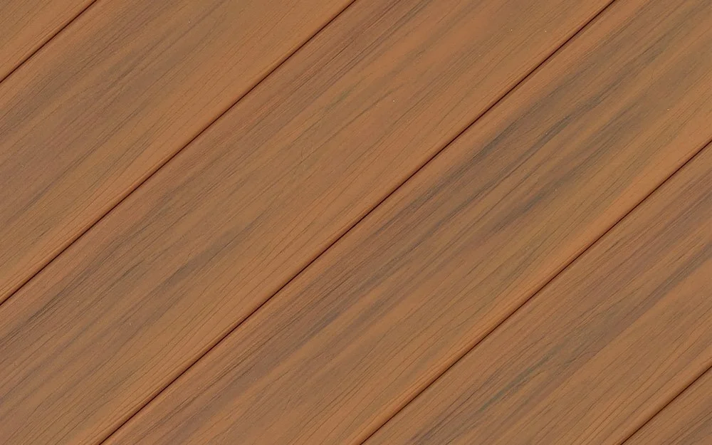 Close-up of Northern Arbor deck boards with a natural brown finish