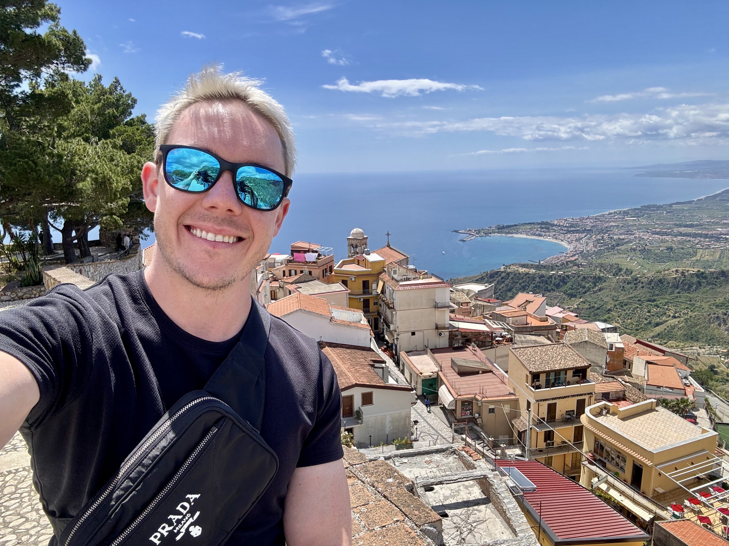 Go to Europe on points. Pictured: PointSuite founder Matt in Taormina, Sicily, Italy