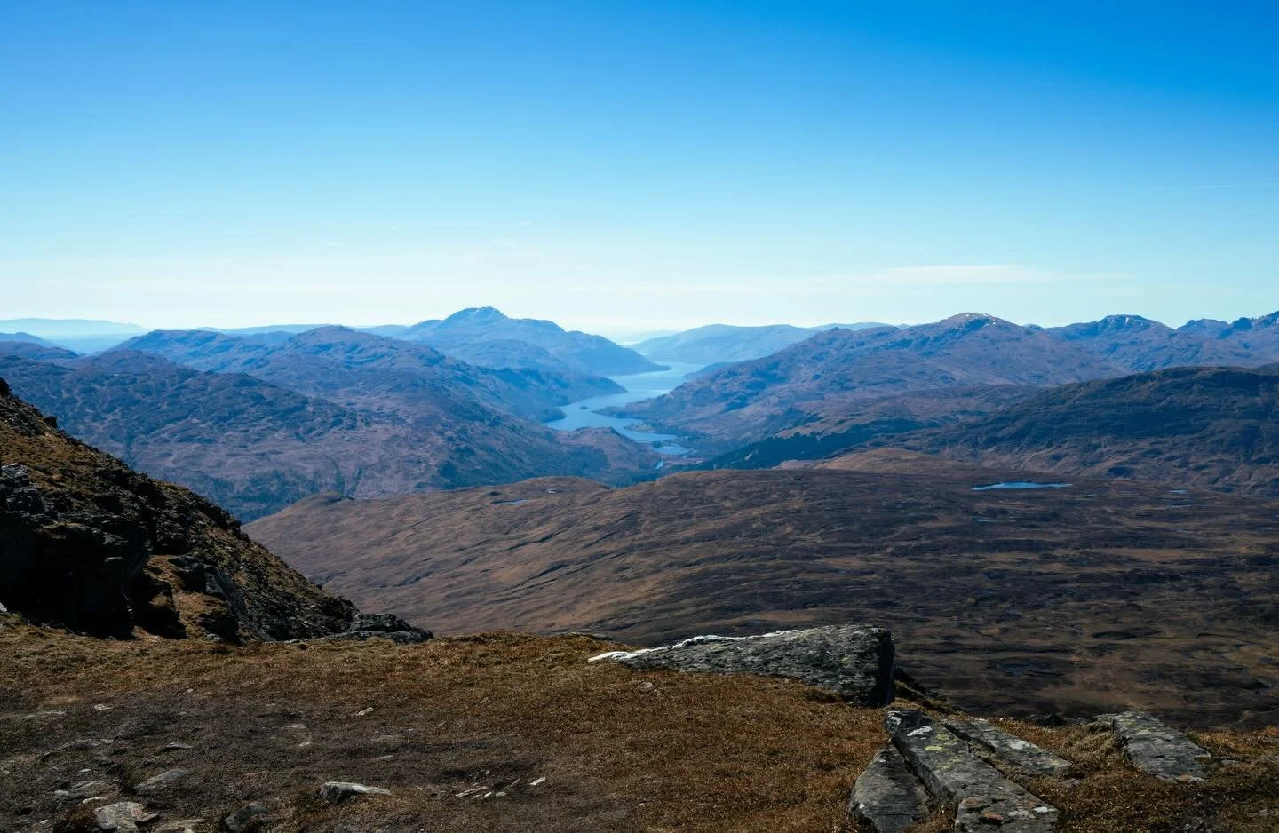 Loch Lomond, Ben Lui, and a ptarmigan all looking beautiful on a recent hike up Ben Dubhcraig and Ben OSs in the Scottish sunshine. Hoping this weather continues as it&rsquo;s been glorious. But can never expect these things in Scotland! Two more mun