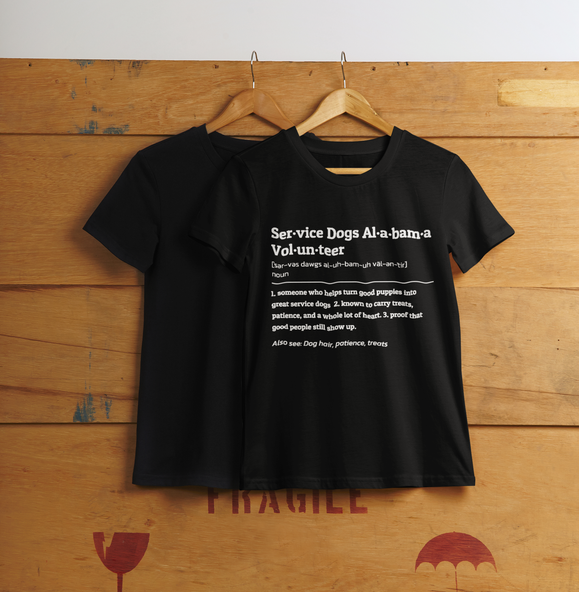 mockup-of-a-t-shirt-placed-on-a-hanger-featuring-a-cargo-box-background-m6277-r-el2.png