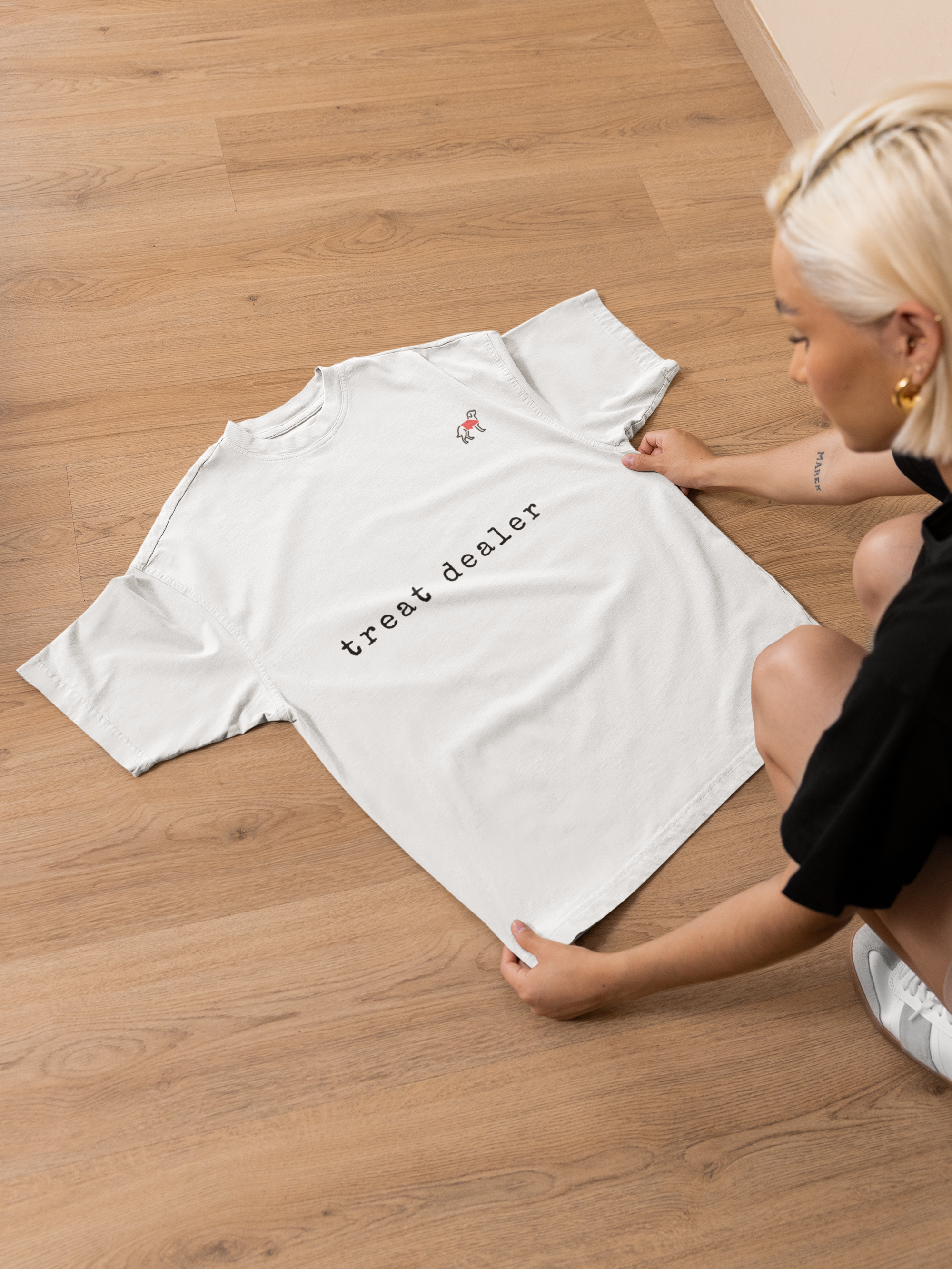 mockup-of-a-woman-putting-an-oversized-round-neck-t-shirt-on-the-floor-m52024.png