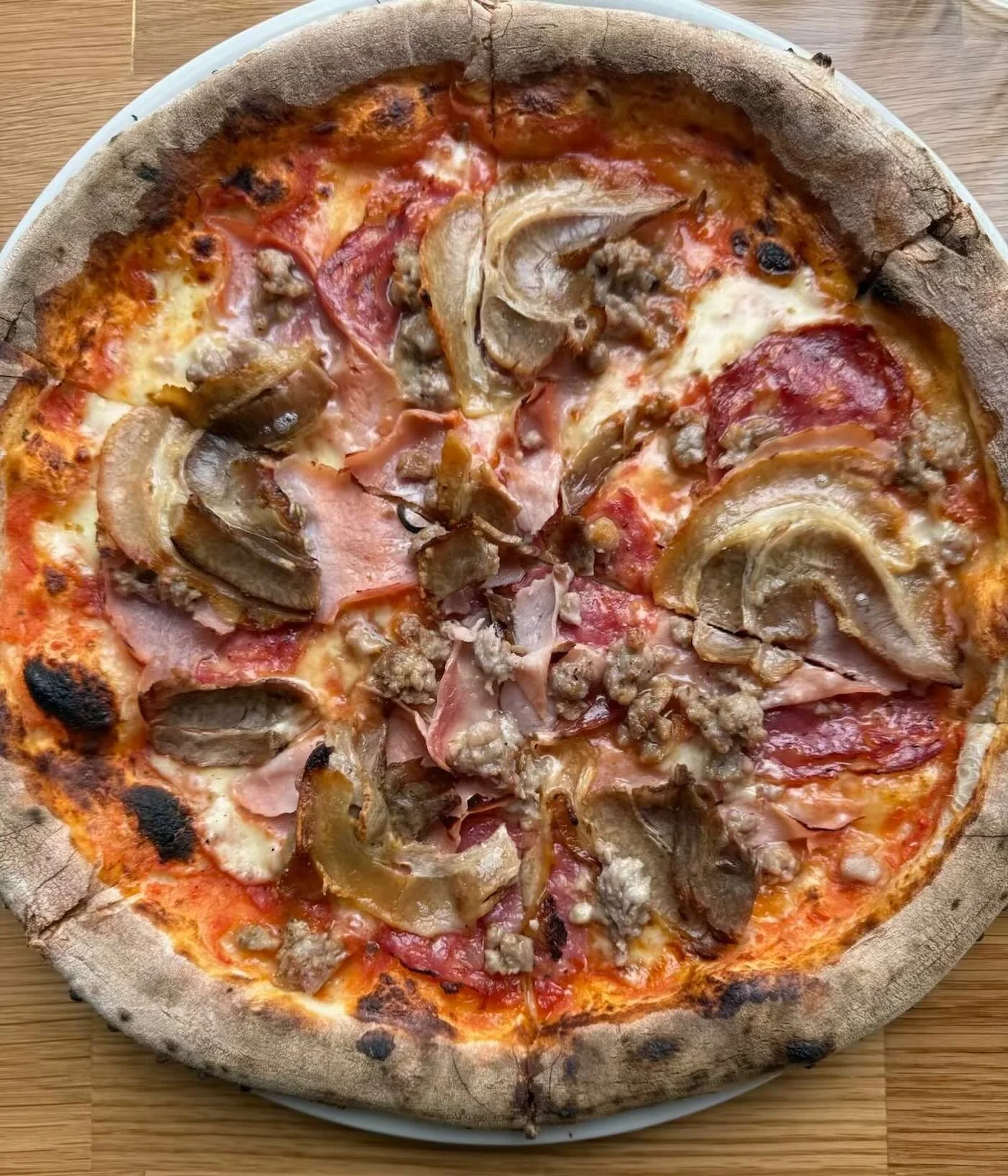 IL MACELLAIO &mdash; &lsquo;The Butcher&rsquo;
Our ultimate meat-lover&rsquo;s pizza.
Tomato, Italian sausage, salami, ham off the bone, pork belly&hellip; all the good stuff, all on one perfect base.

Big flavours. Big comfort. Big yes.
Available lu