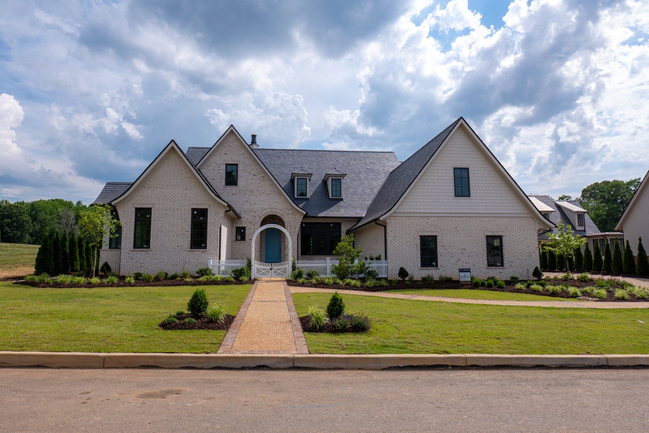 Luxury Driveway and Natural Stone Patio for a Custom Home