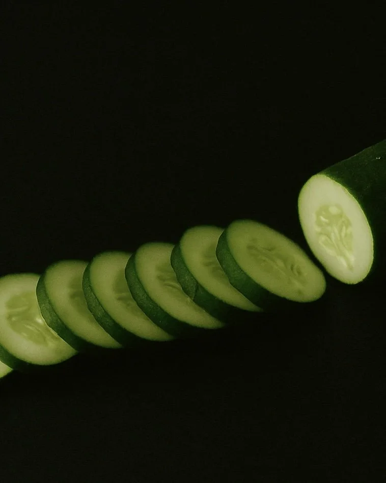 Slices of cucumber on a black background