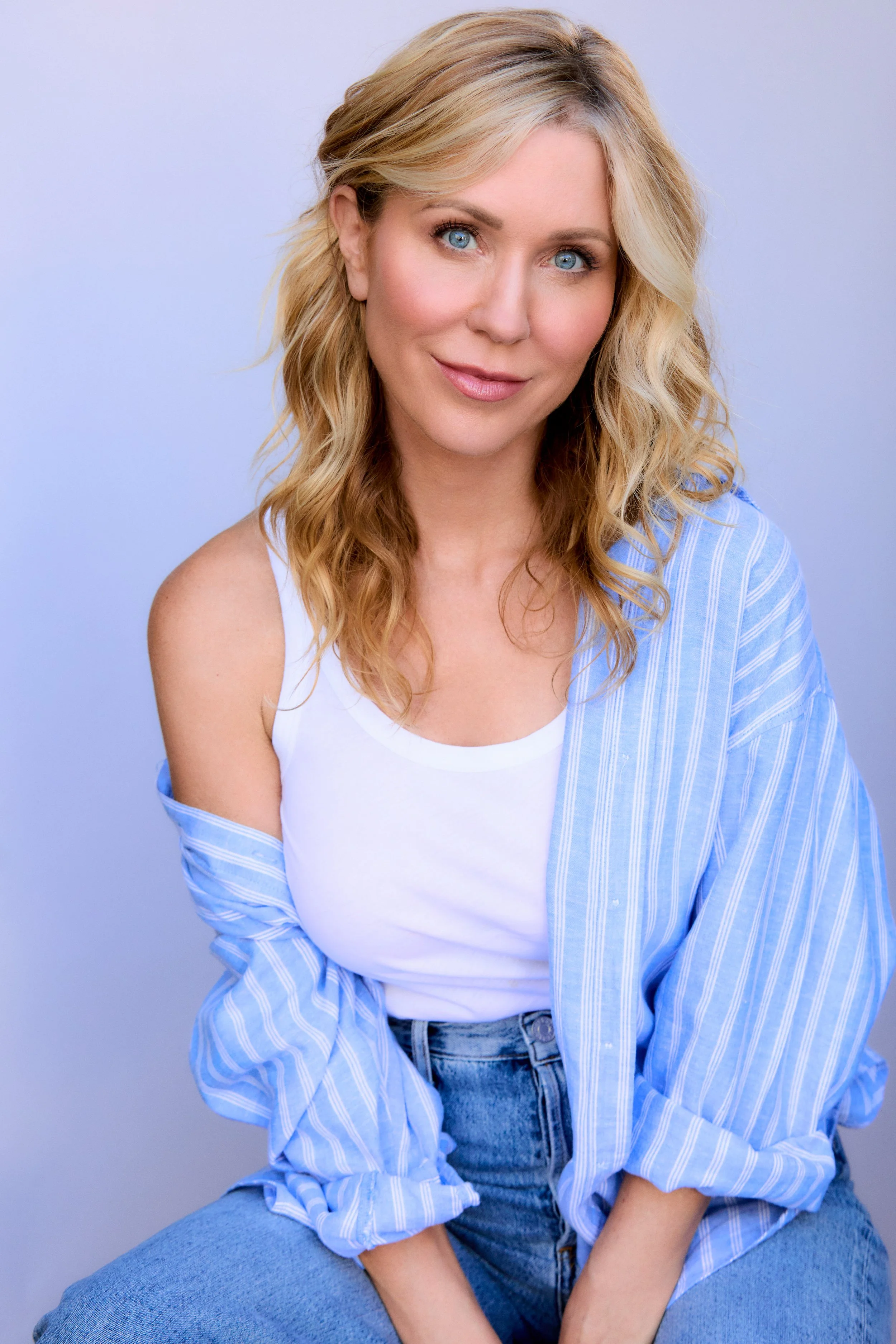 KatieOGBlueStrippedHeadshot1.jpg