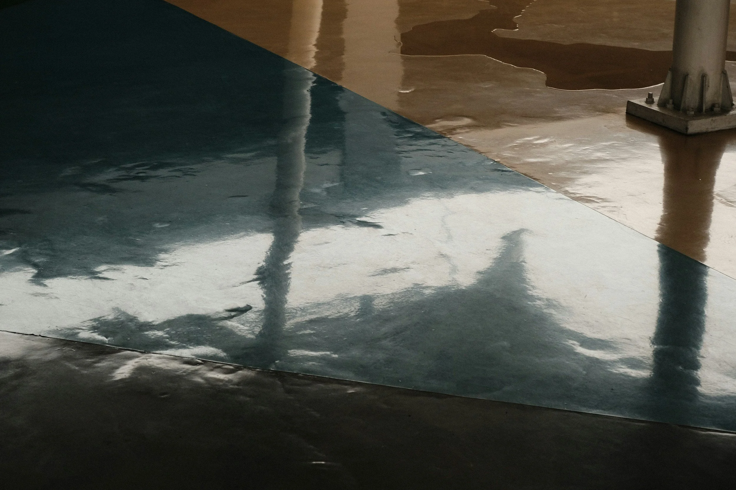 a warehouse floor with water flooding
