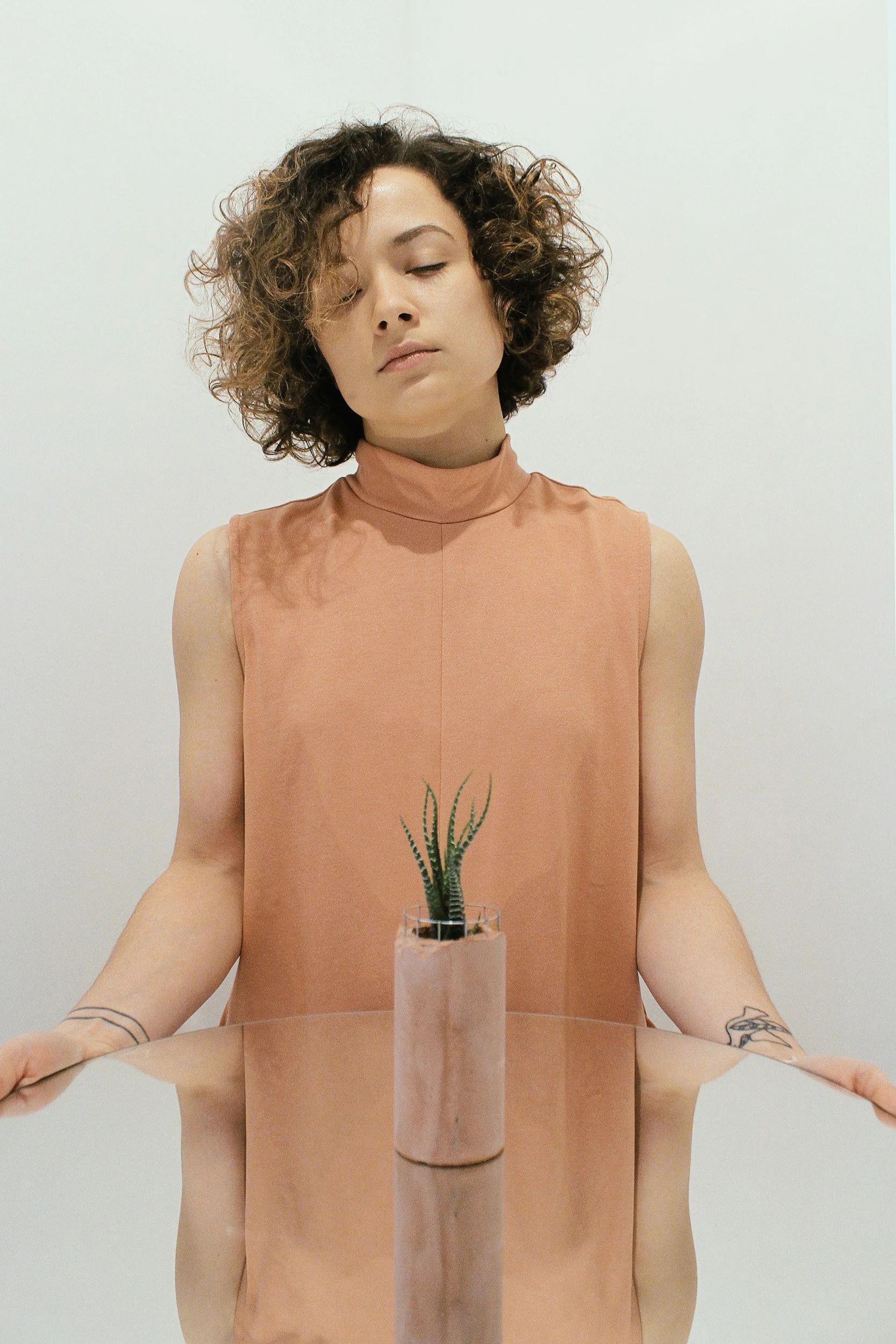 women with eye closed