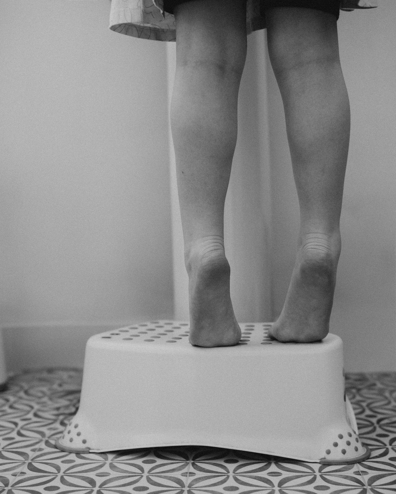 A little moment I nearly missed, 
tiptoe feet on a stool, reaching up to brush tiny teeth.
Steady, determined, completely absorbed.

It&rsquo;s nothing really...
and yet everything.
One of those fleeting, ordinary rituals that feels almost poetic whe