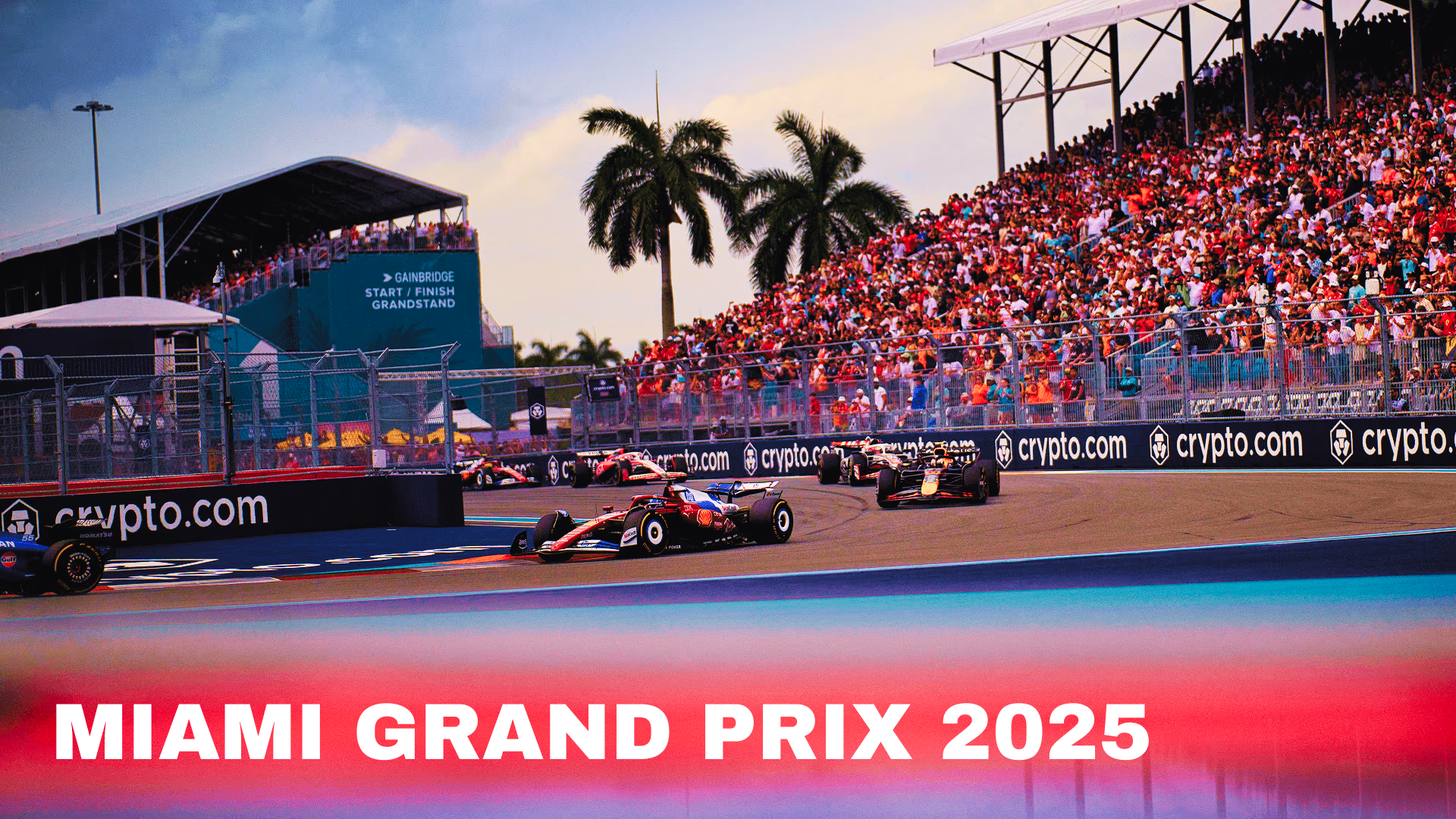 Race cars speeding around the Miami Grand Prix 2025 circuit with a large crowd in the grandstands, palm trees, and a start/finish line banner.