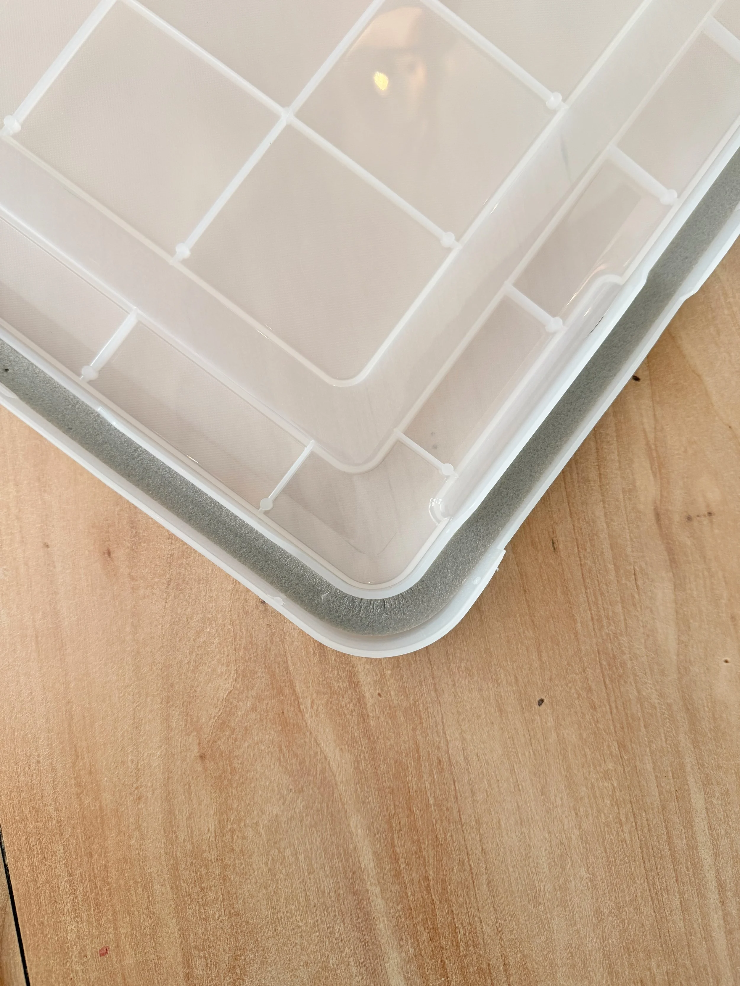 Weathertight seal inside the lid