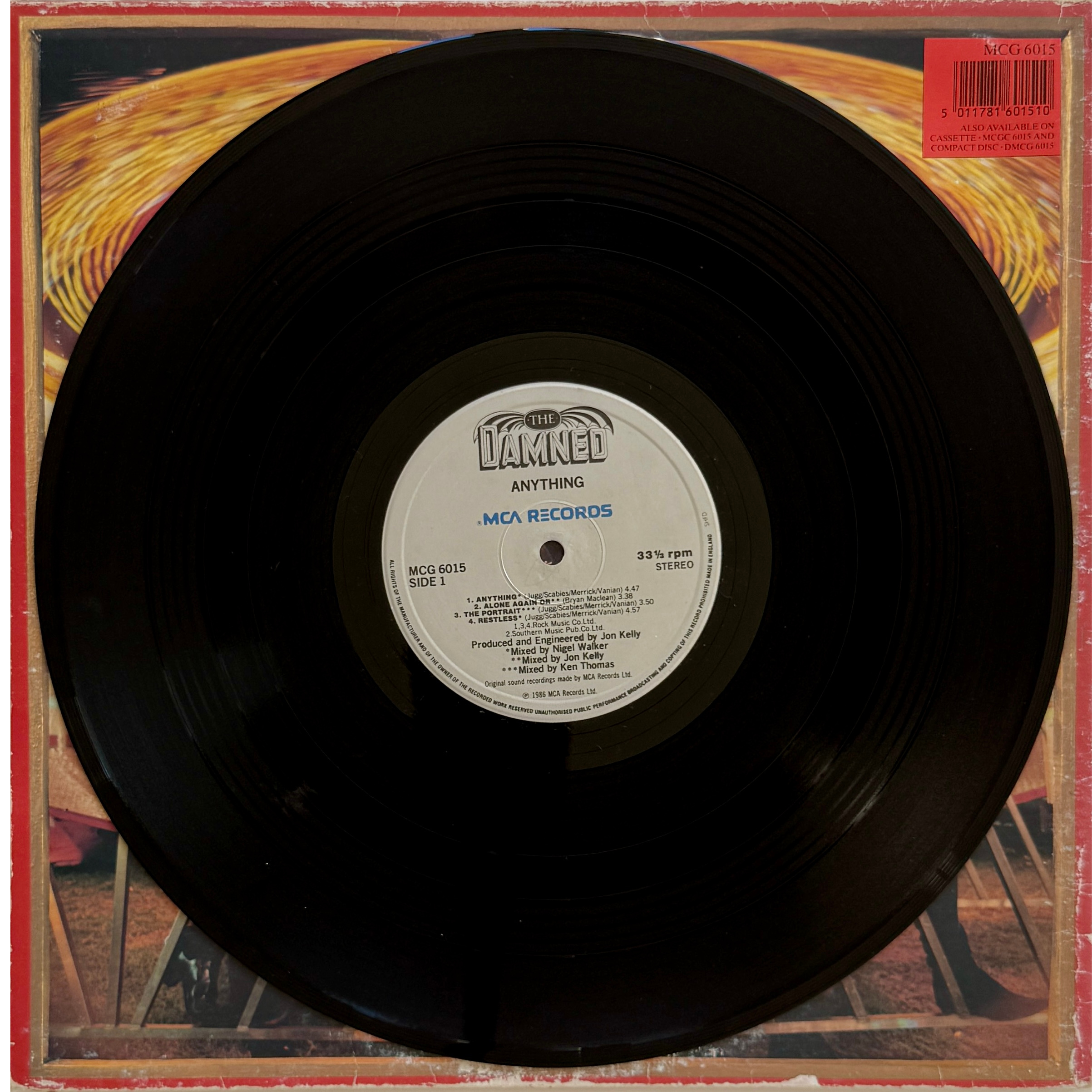 55_the damned_side 1_vinyl record.png
